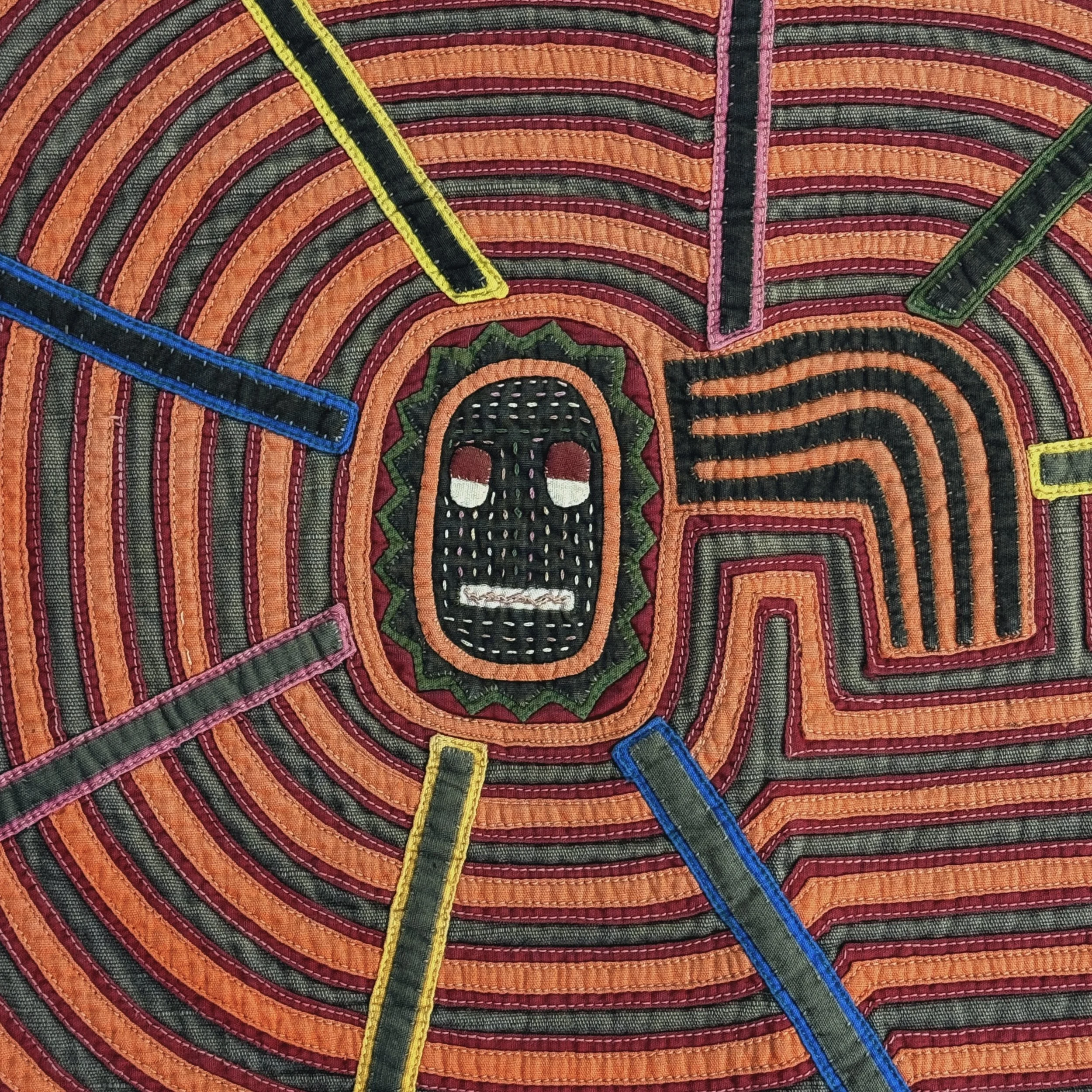 Vintage Guna mola panel, abstract radiating pattern and spirit figure, Parker and Neal collection