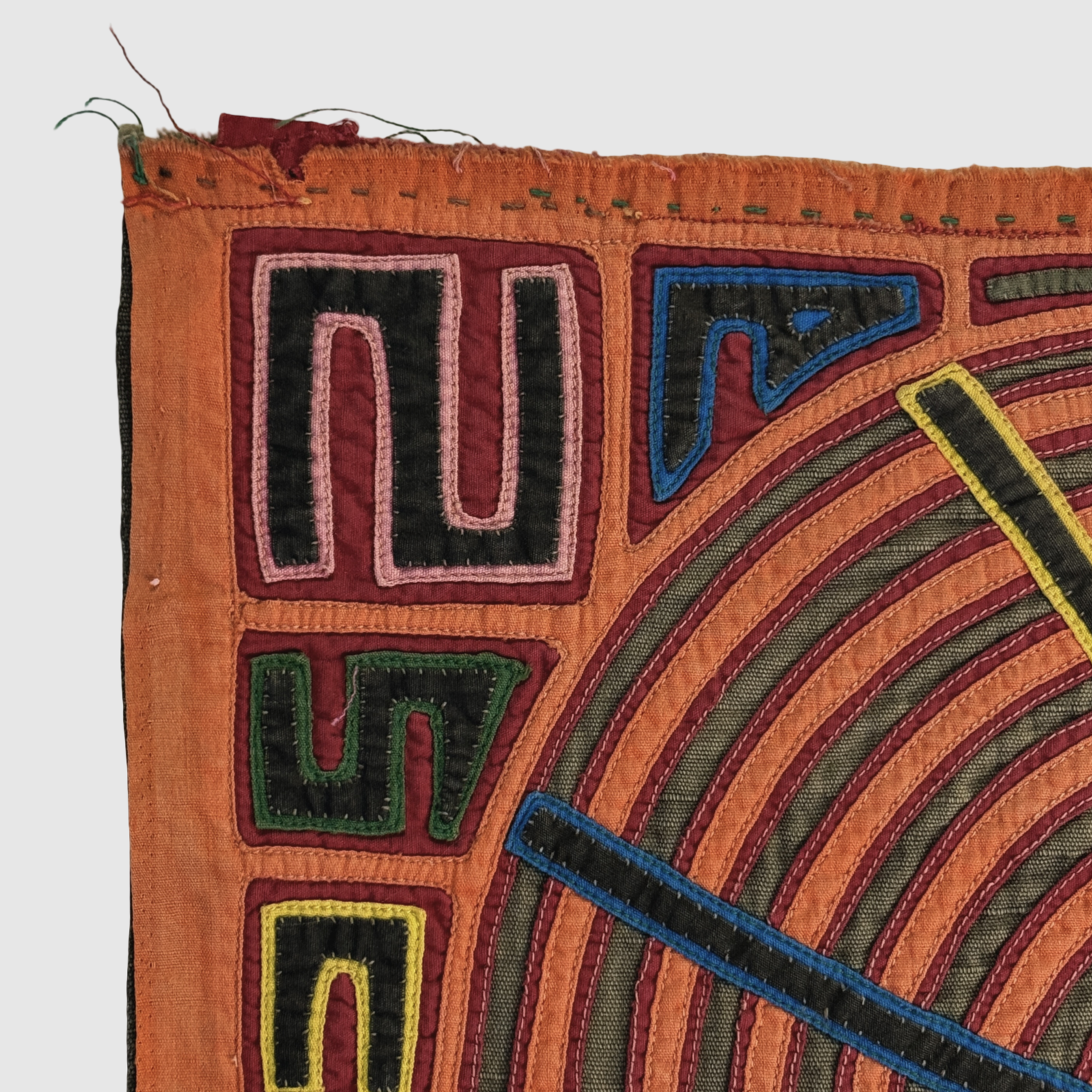 Vintage Guna mola panel, abstract radiating pattern and spirit figure, Parker and Neal collection