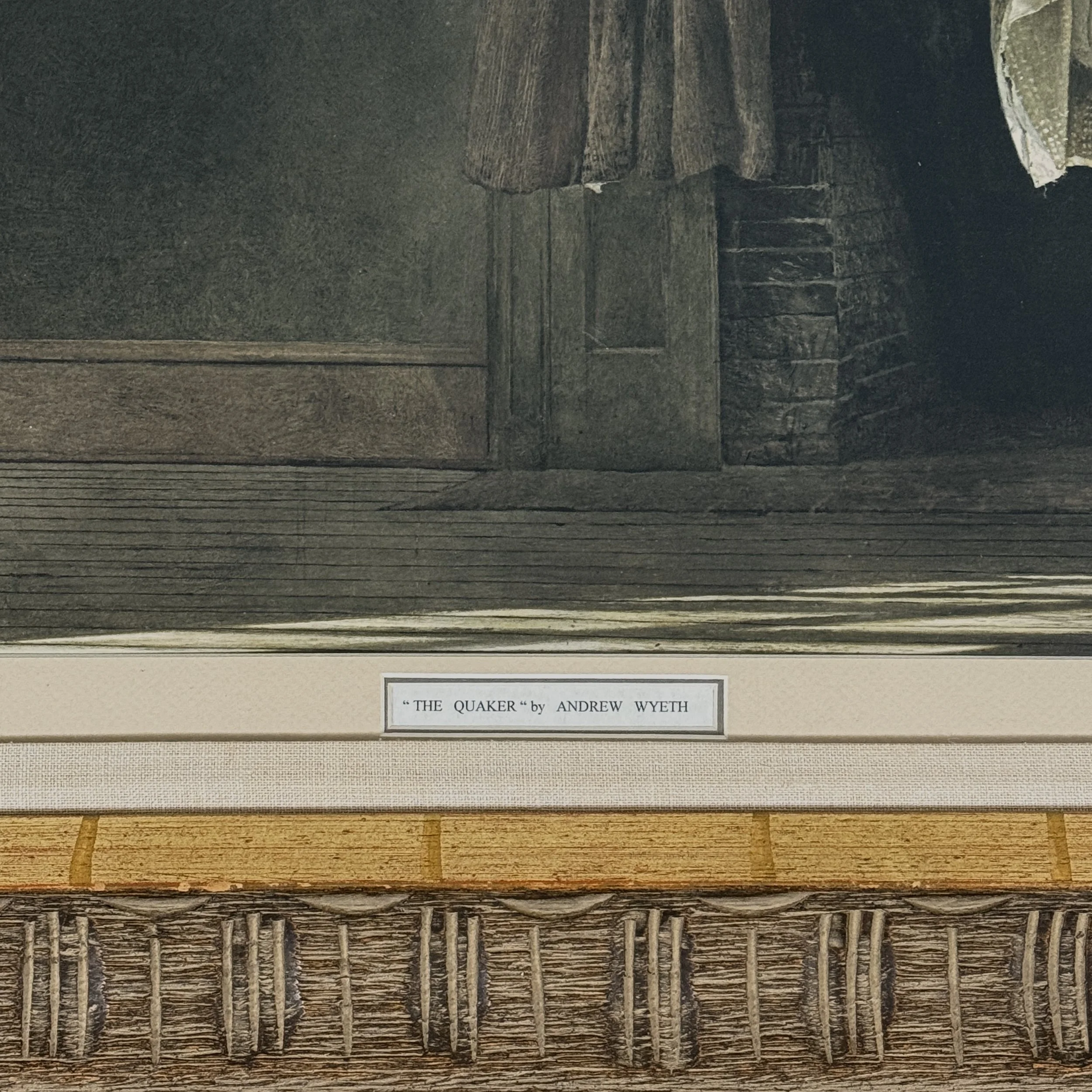 Close-up of the printed label at the bottom margin of the collotype.