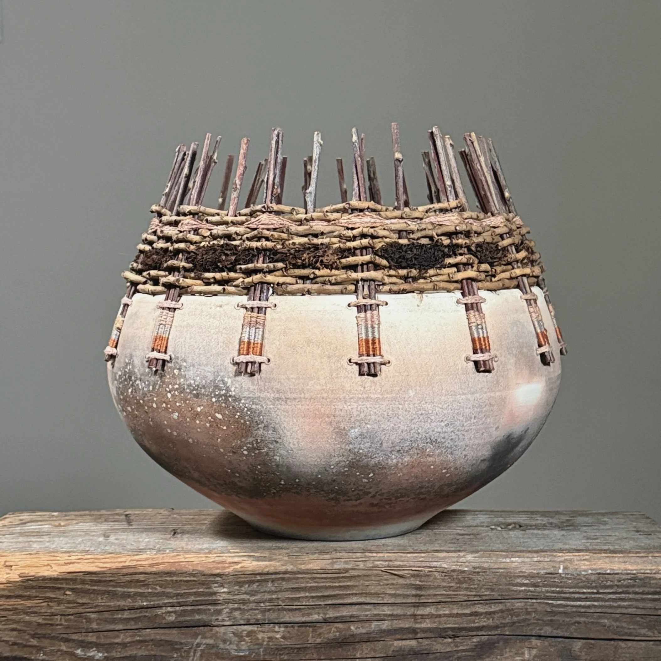 Mixed media raku ceramic and fiber vessel