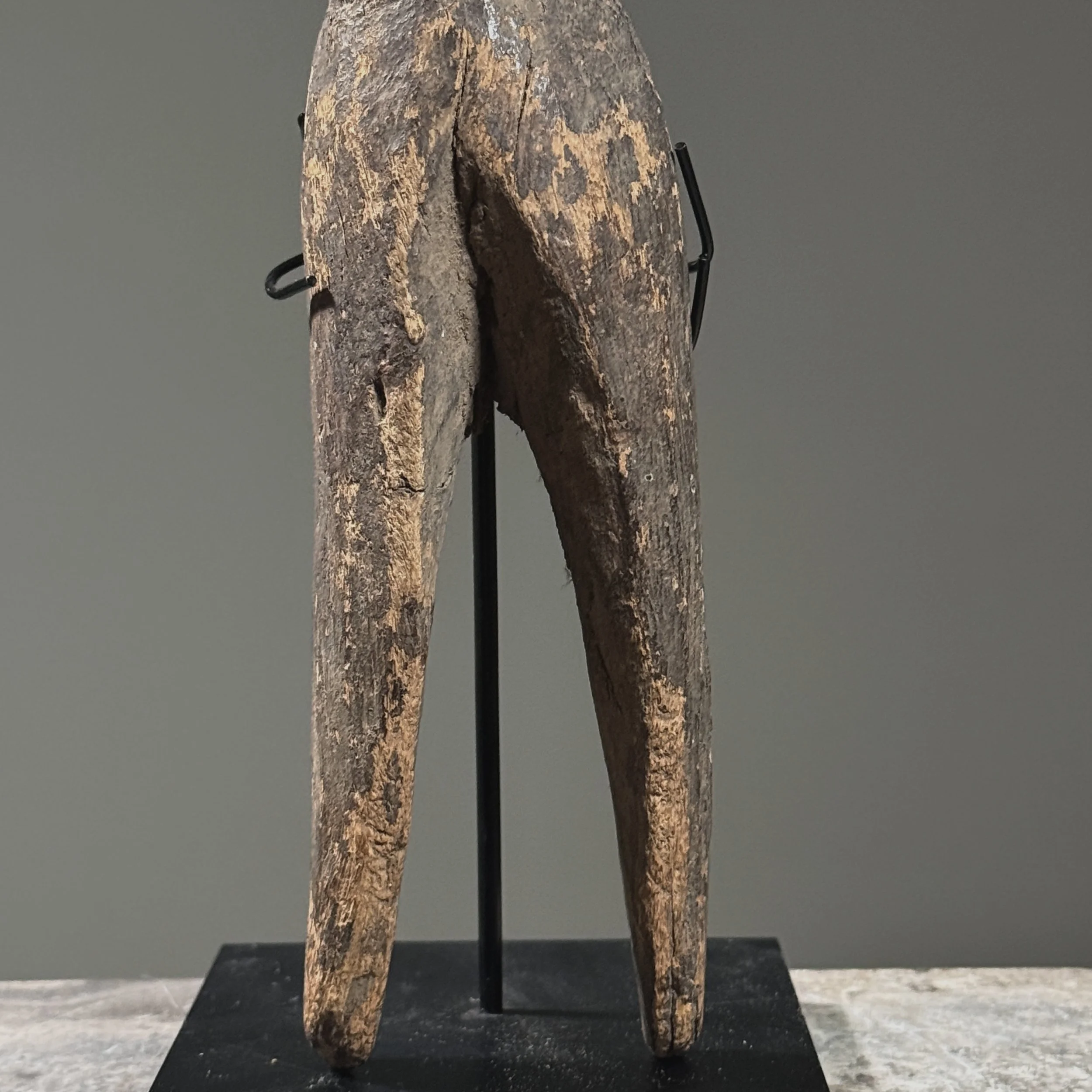 Macro detail of the wood grain and patina developed through decades of handling and exposure