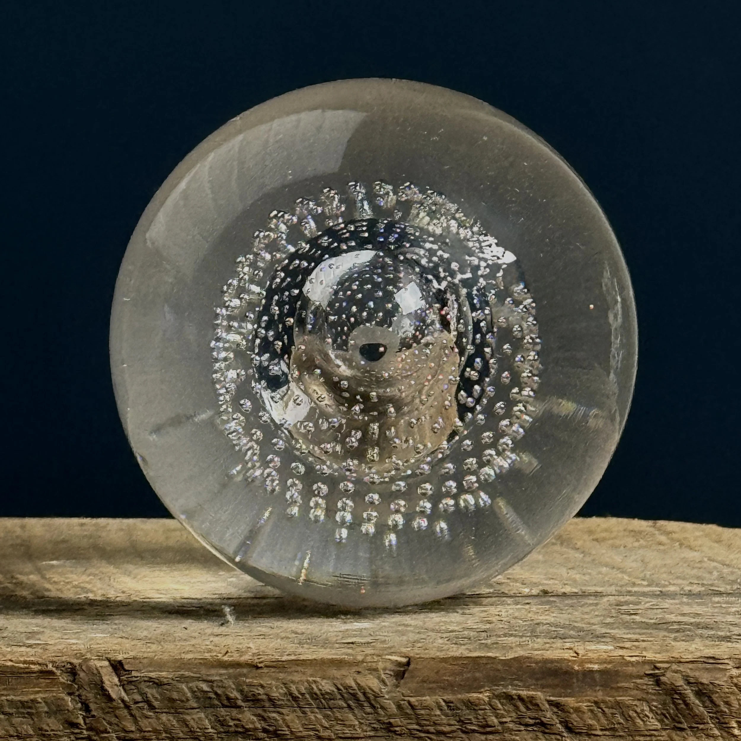 Bottom of paperweight.