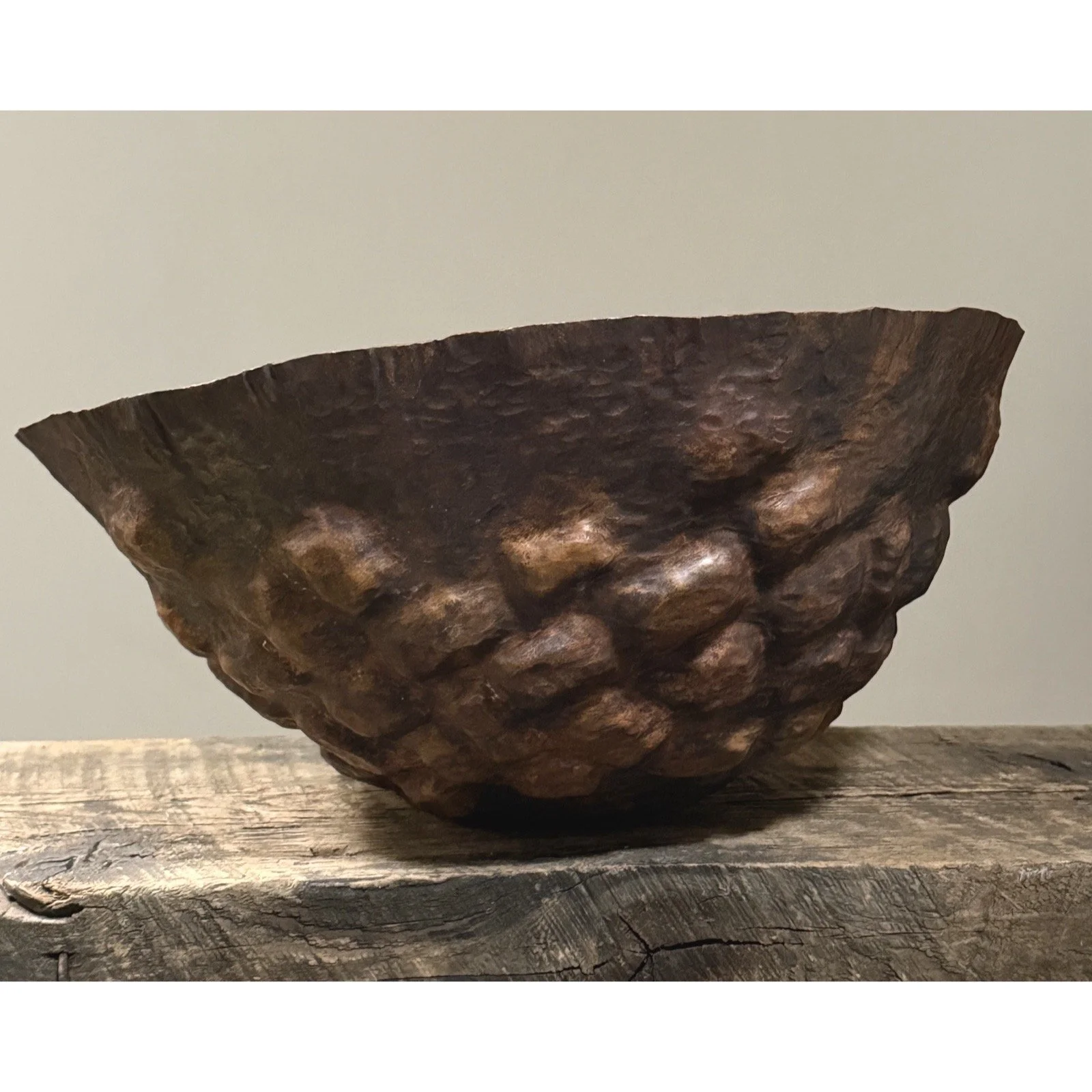Side view showing the sculptural hammered texture and patina of Di Bona copper bowl.