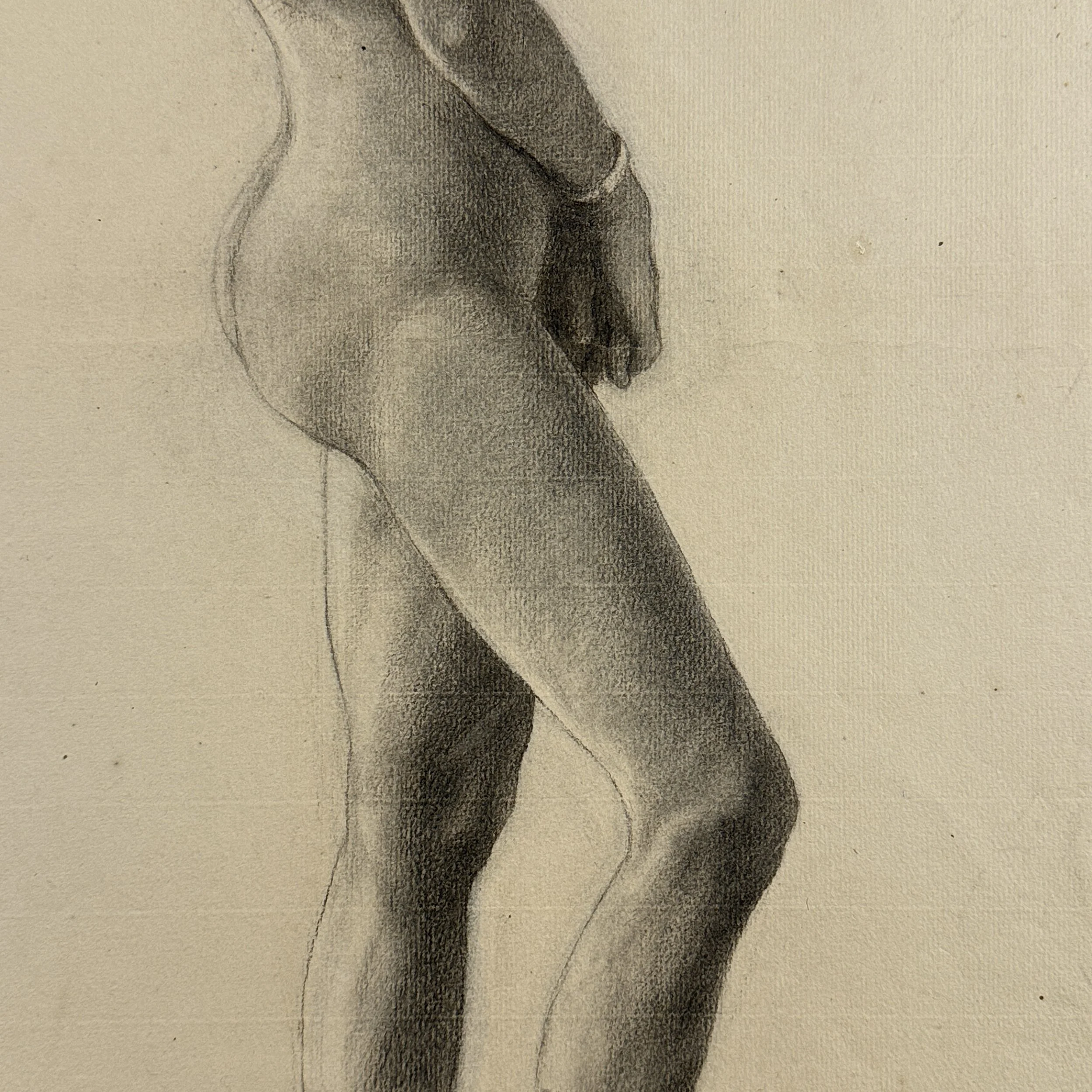 Academic nude study with folded hands