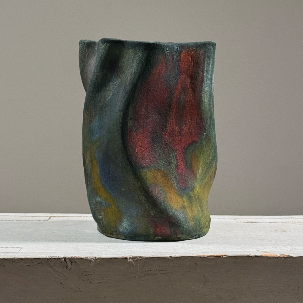 Vintage raku fired abstract fluid shaped blackware ceramic vessel, signed