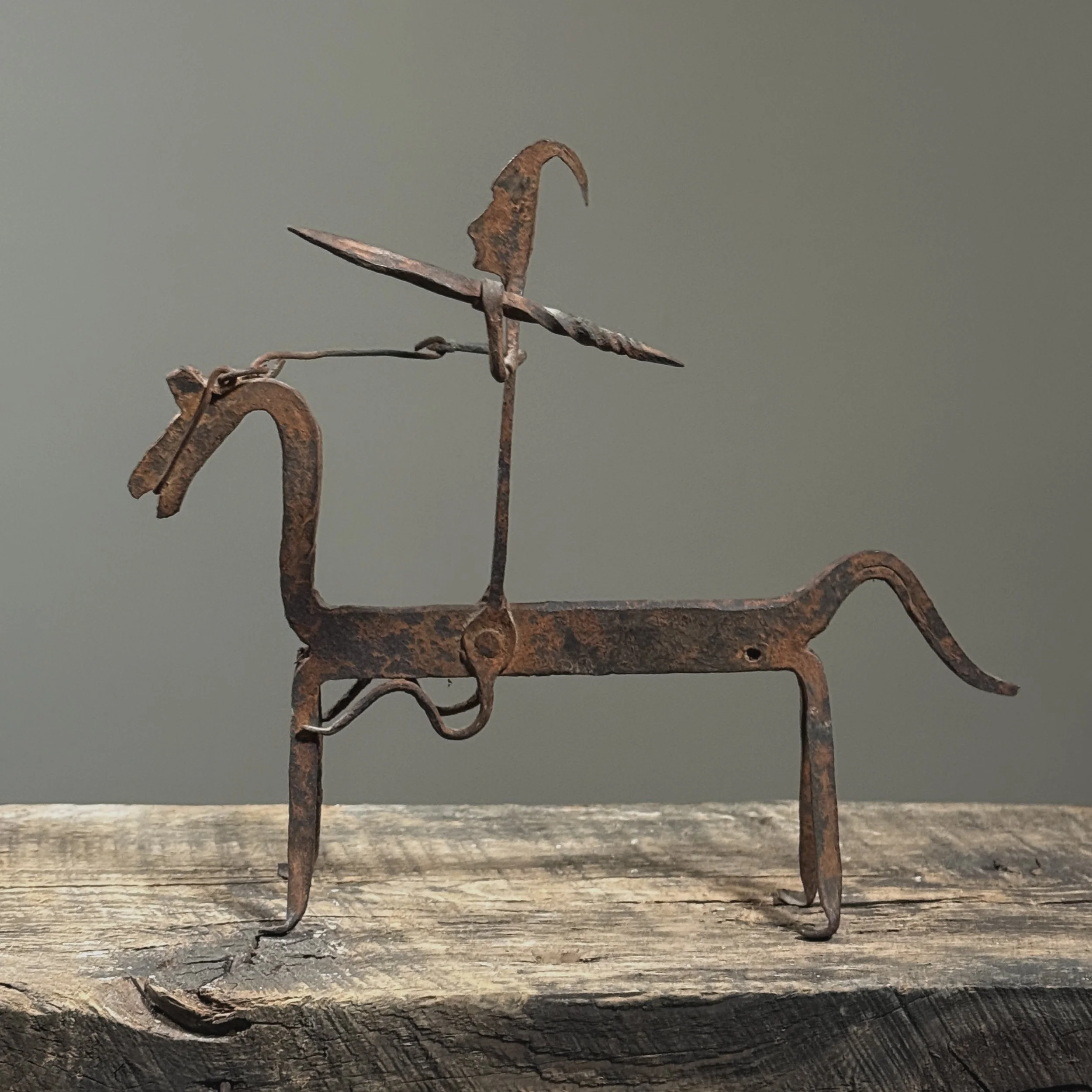 African Dogon iron sculpture with spear and rein