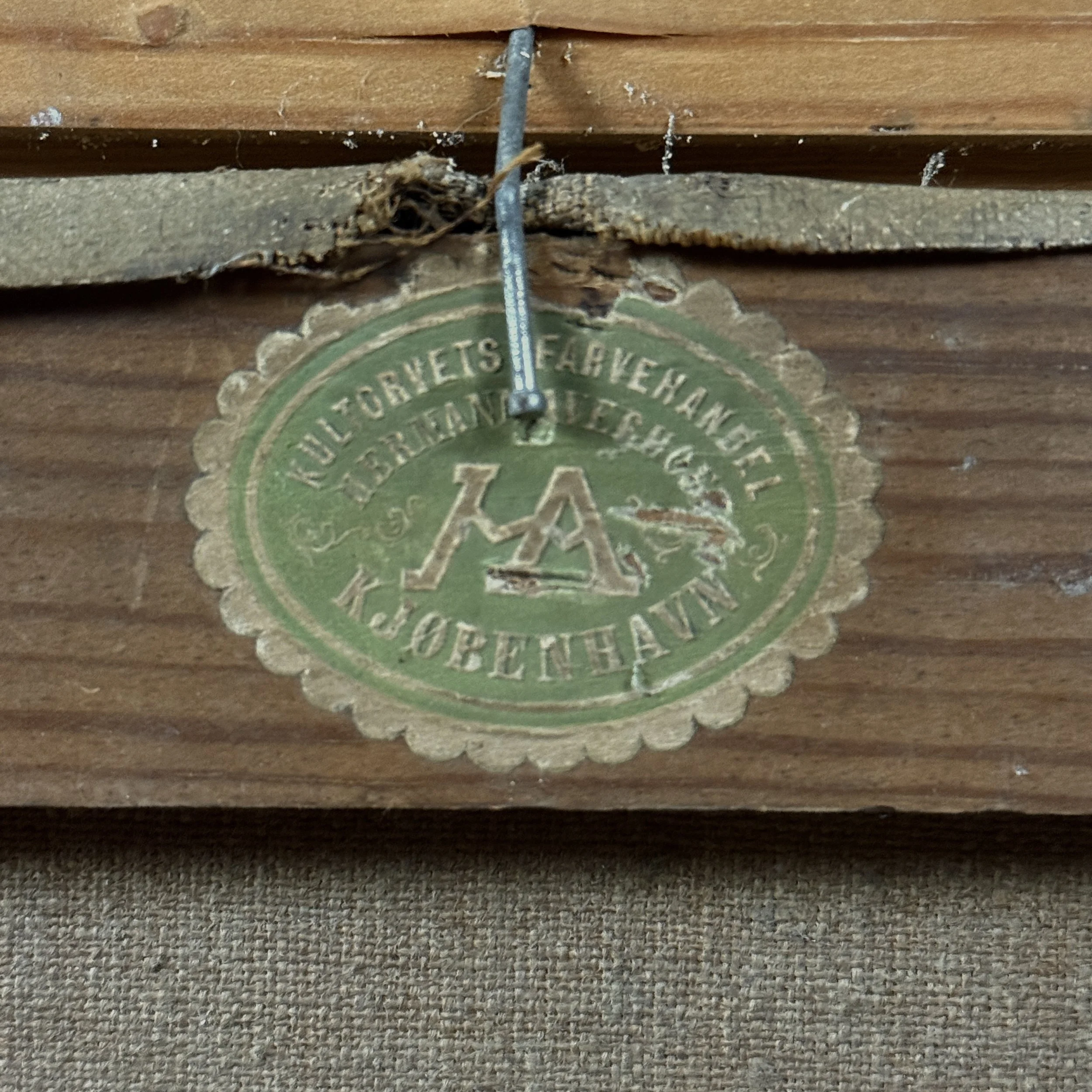 Detail of label on verso from Kultorvets Farvehandel, Kjøbenhavn, Denmark, on antique floral still life