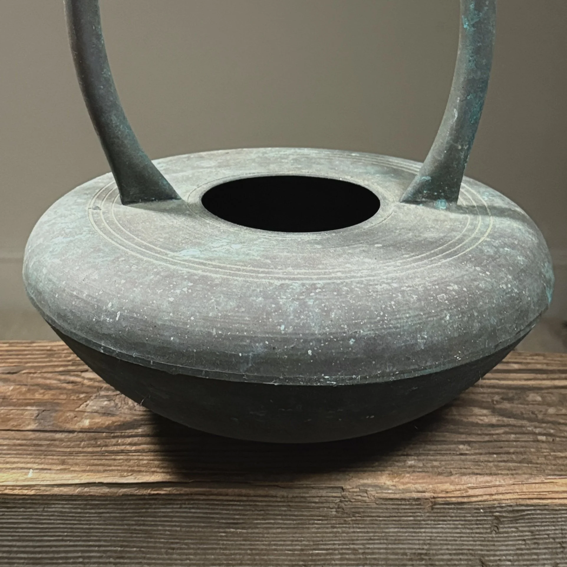 Vintage Japanese Modernist verdigris metal vessel with handle. 15 inches height by 10.75 inches diameter.
