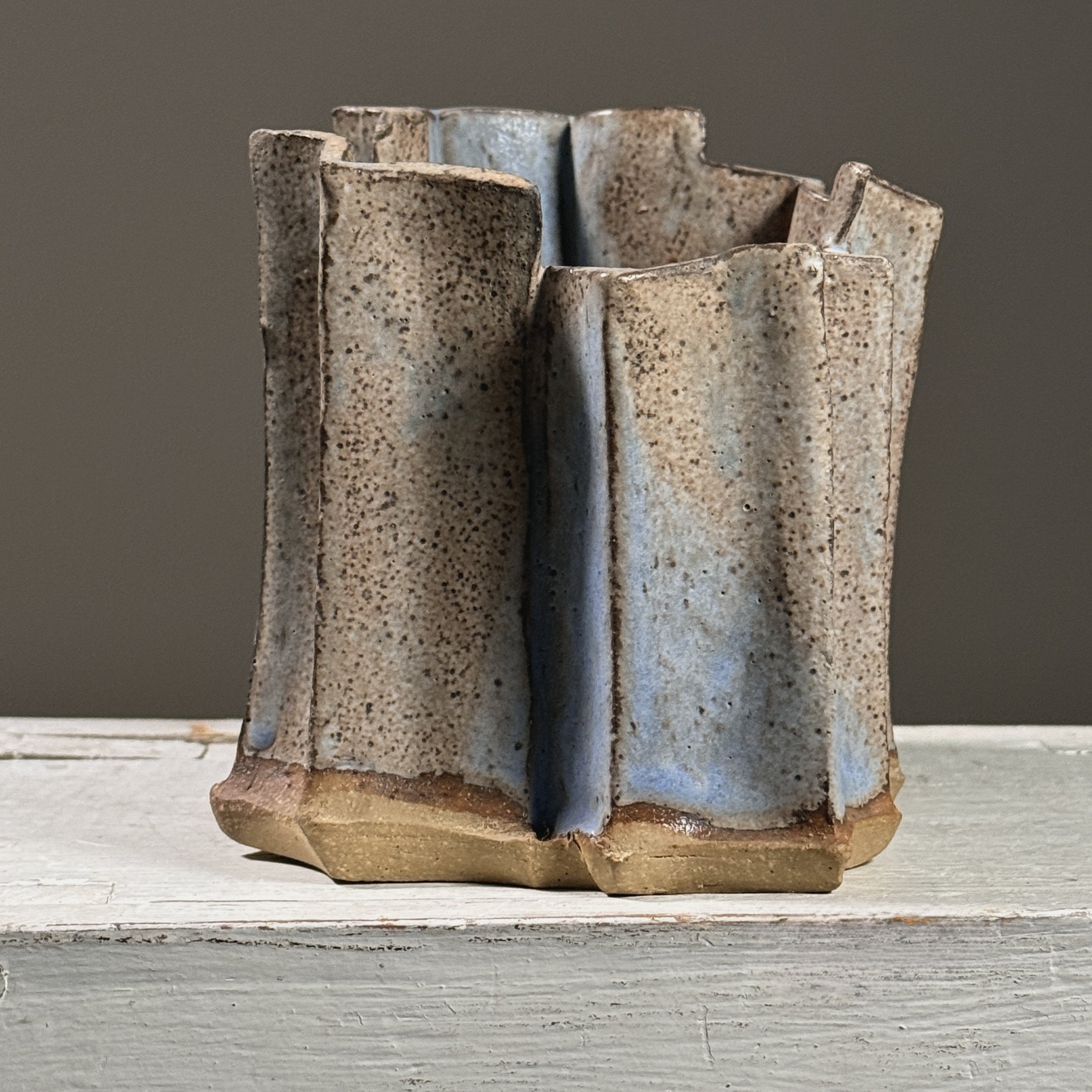 Side profile emphasizing the vessel's width and height.