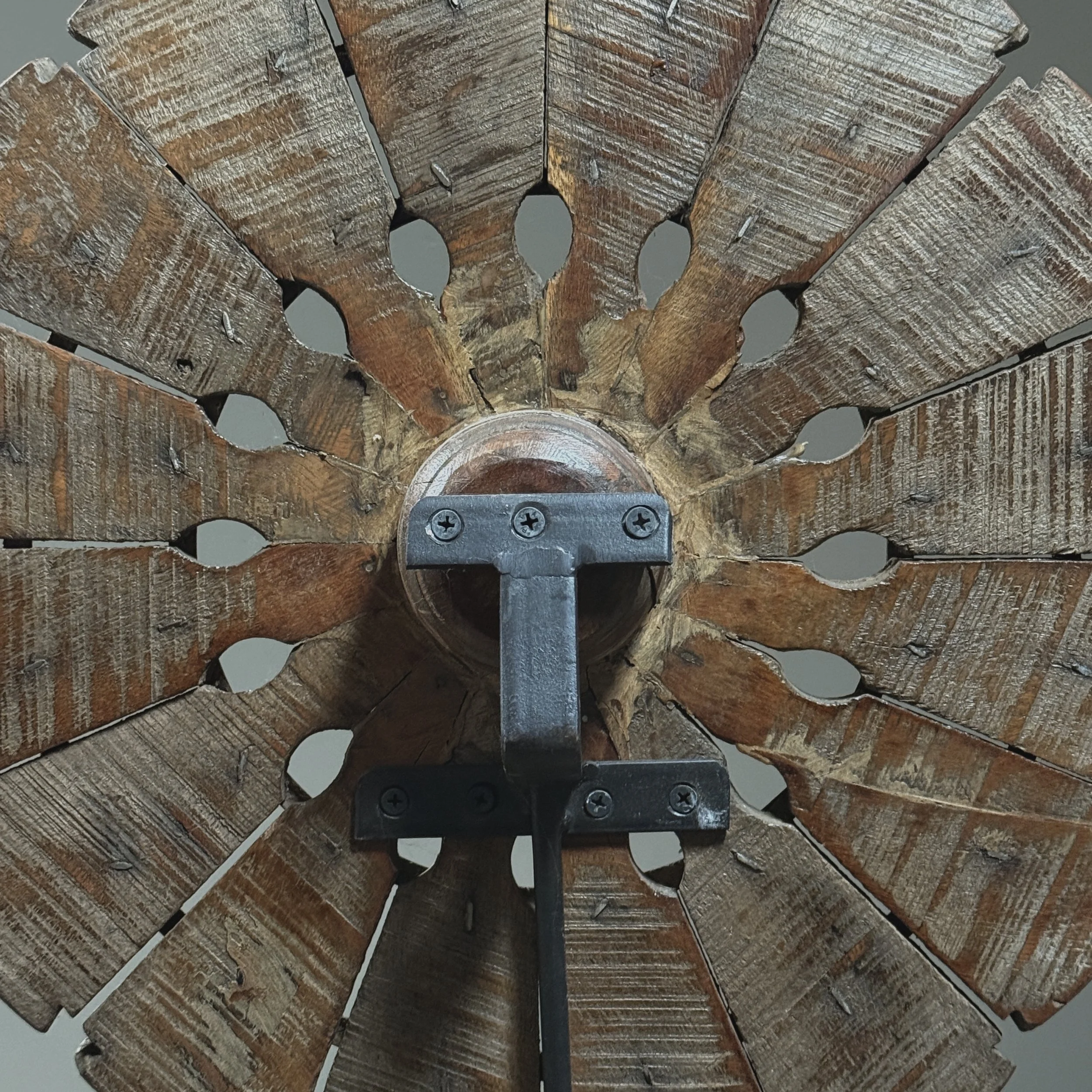 Wheel close-up. Spokes and rim. Hand turned wood.