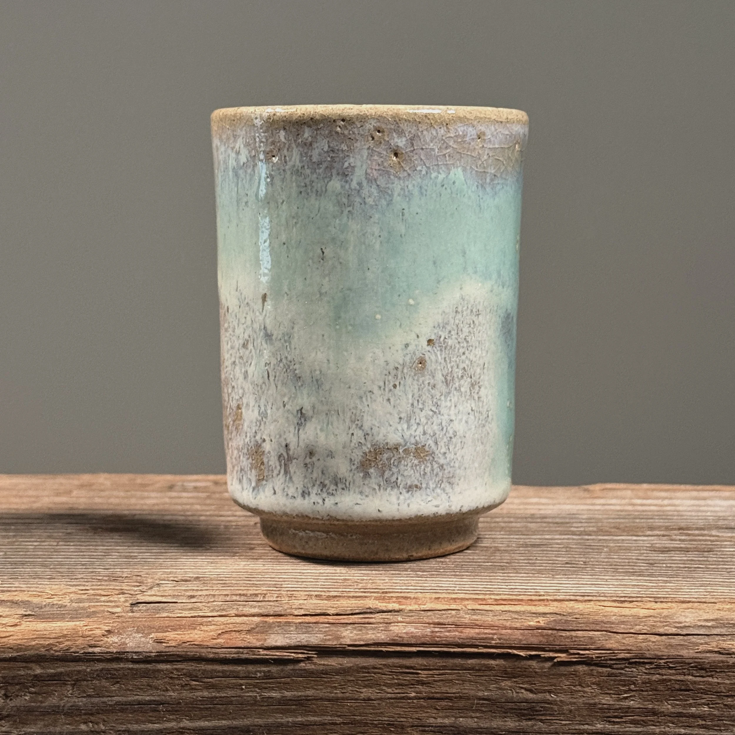 Side view of blue cup.
