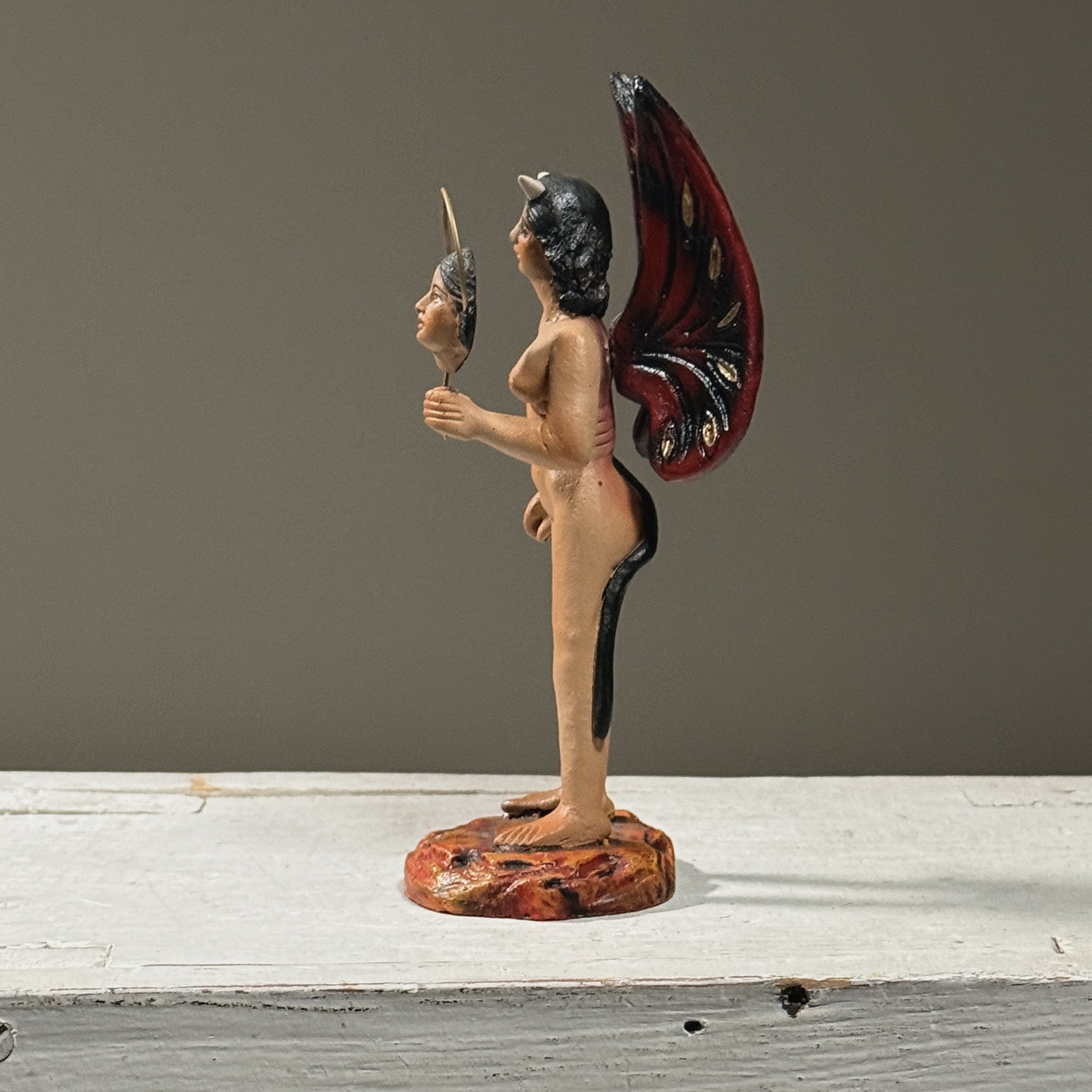 Side view. 3 inches width. Wing and arm detail visible.