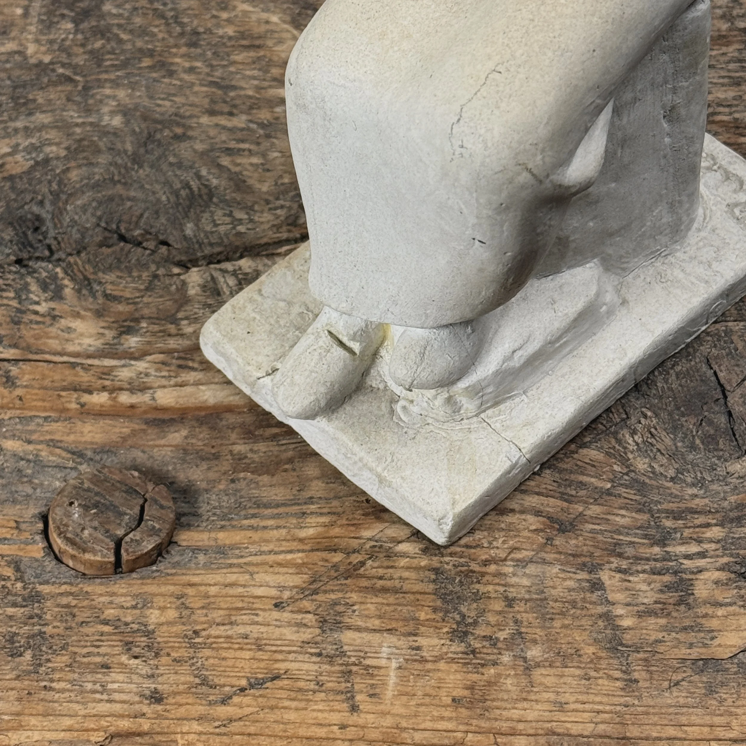 Repair close-up. Damage and restoration at foot.
