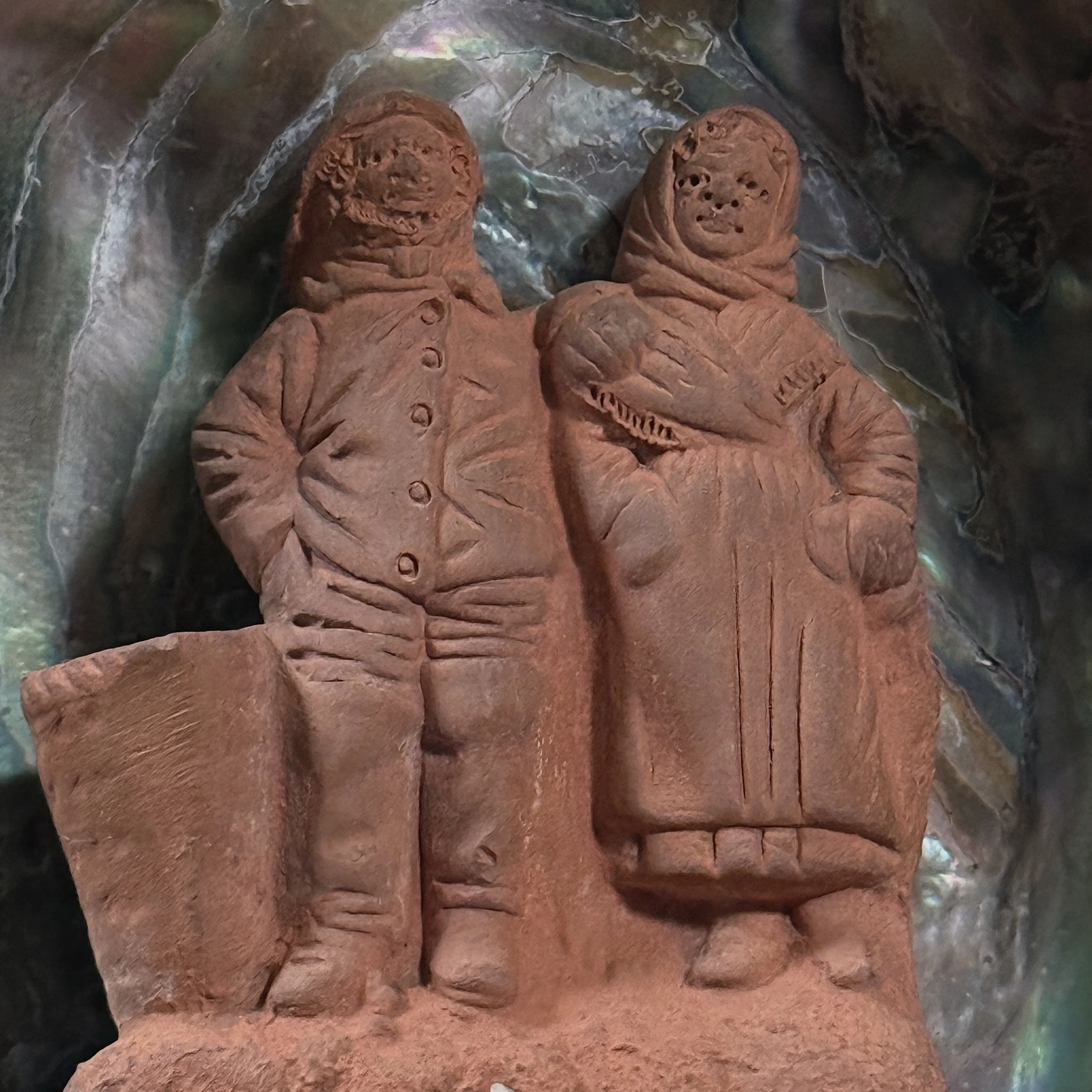 Attributed to Pierre-Adrien Graillon, French terracotta couple in abalone shell, Dieppe folk art