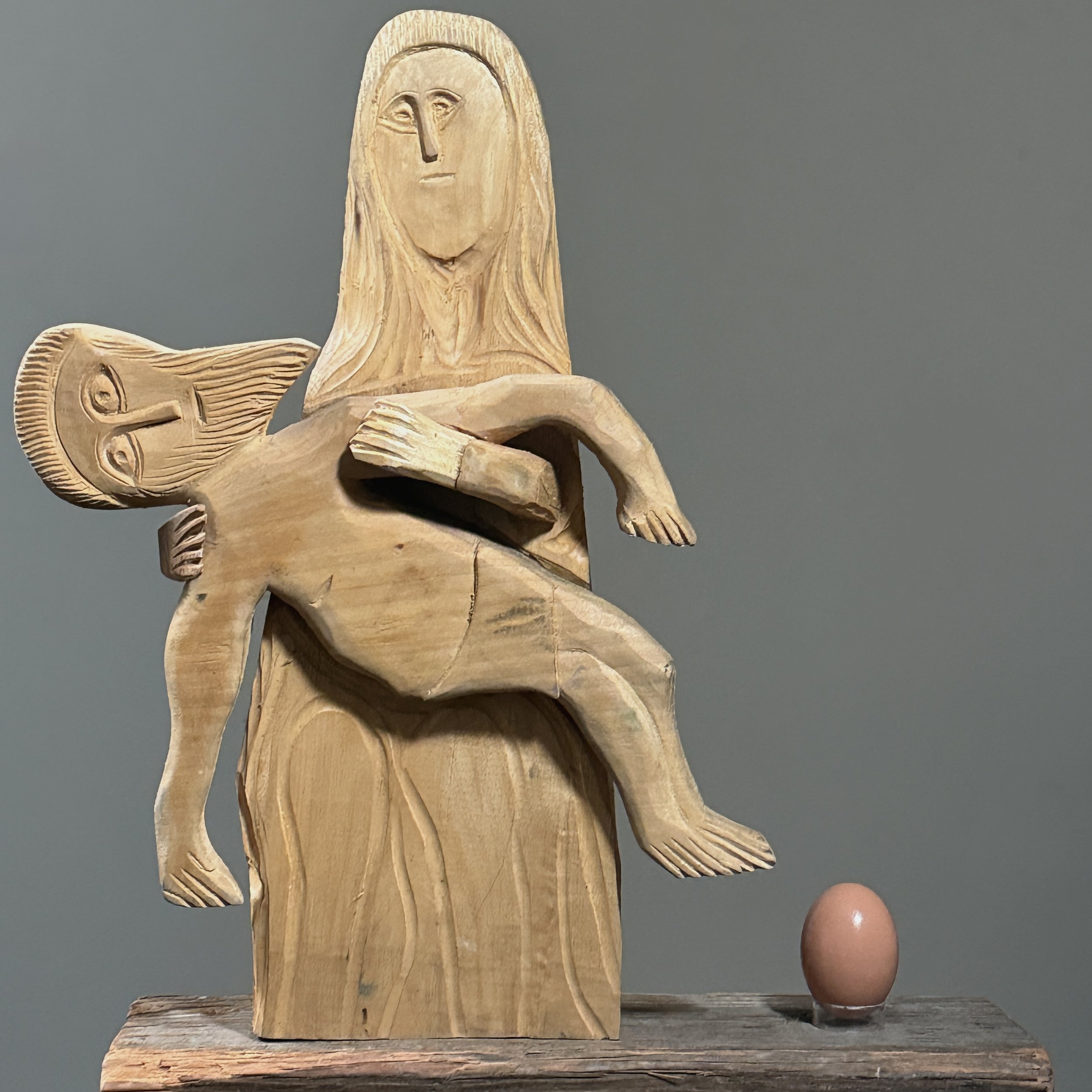 The sculpture shown with an egg for scale reference.