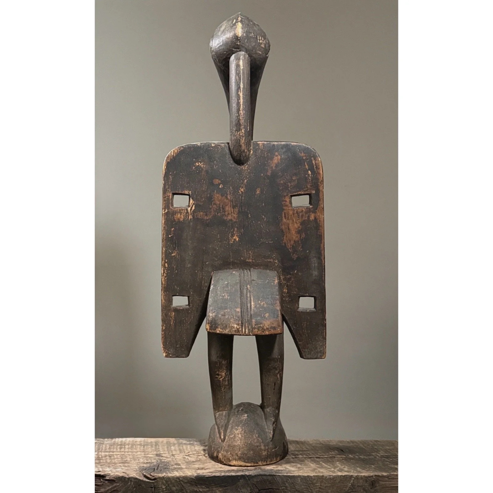 Full height view of tall Senufo Calao bird carving