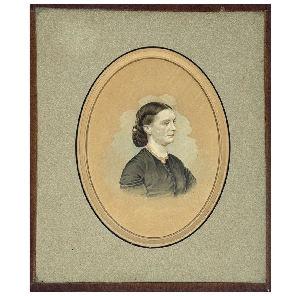 Antique oval gouache portrait of Clara Barton on a beige mat.