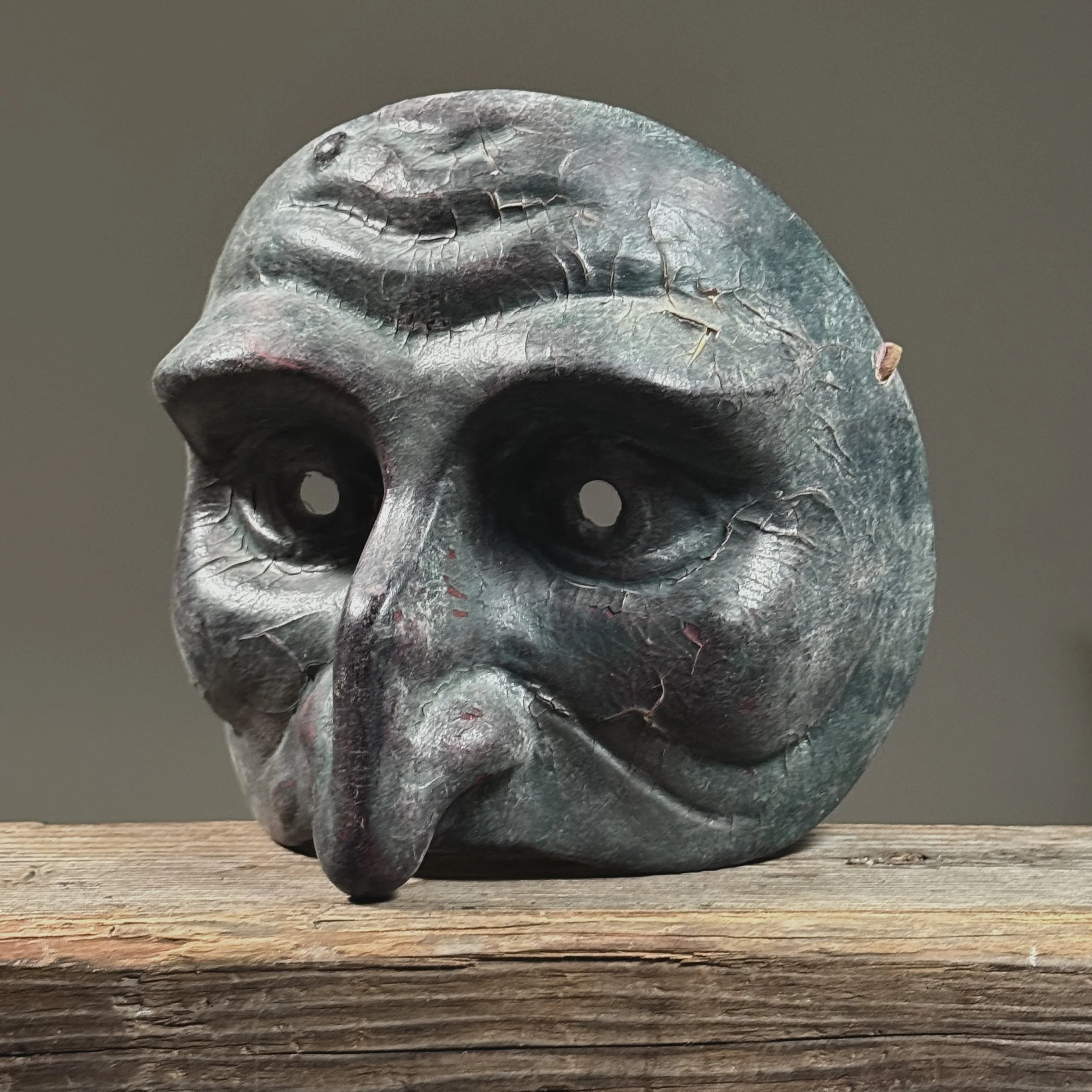 Vintage green hand made Commedia Pulcinella mask. Modernist reinterpretation. 7 inches high by 7.5 inches wide by 6.25 inches deep.