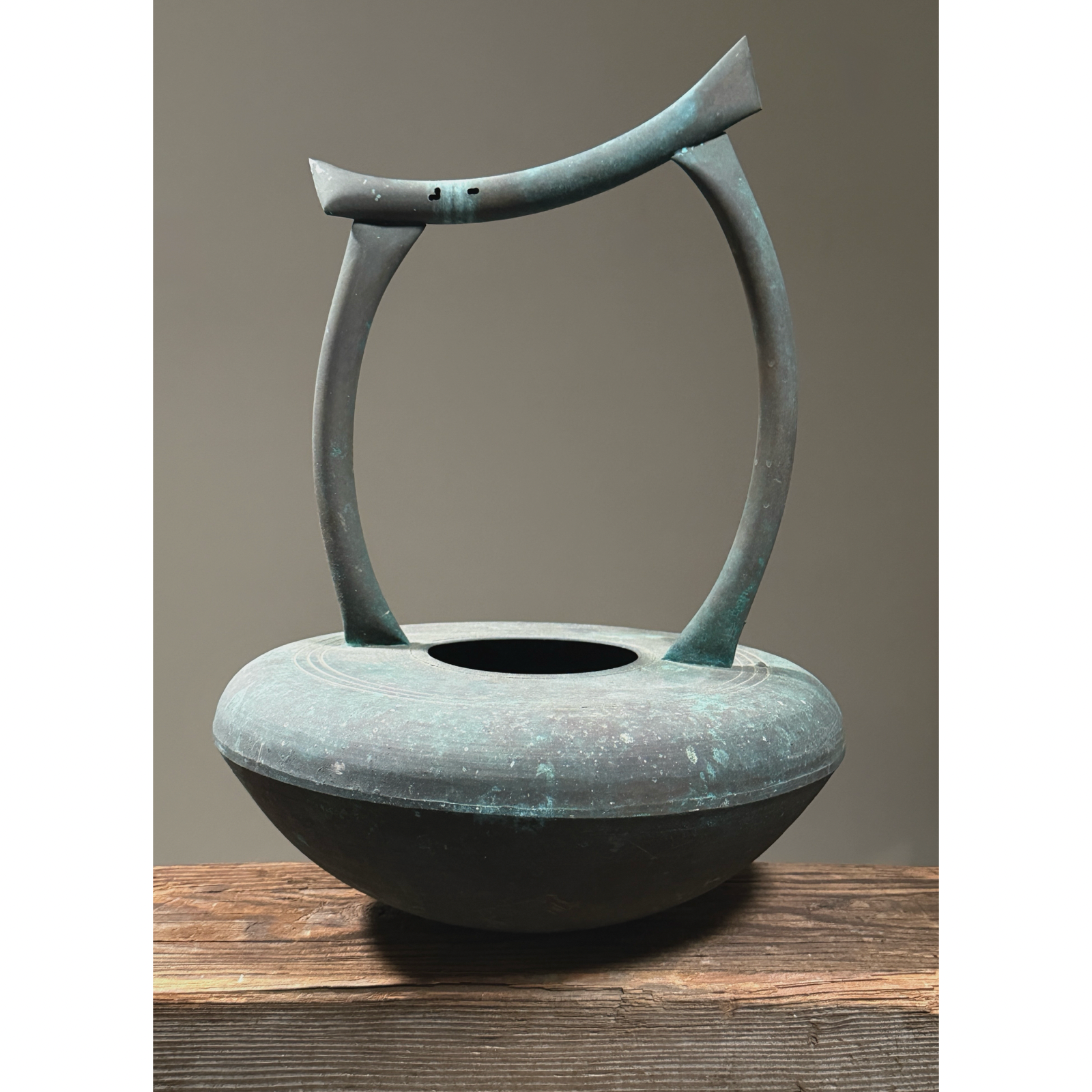 Vintage Japanese Modernist verdigris metal vessel with handle. 15 inches height by 10.75 inches diameter.