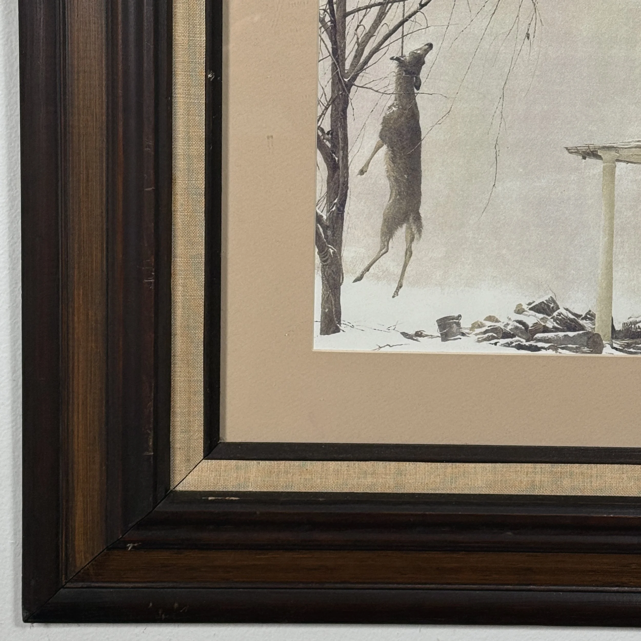 Detail of the linen liner, archival mat, and edge of the glazing.