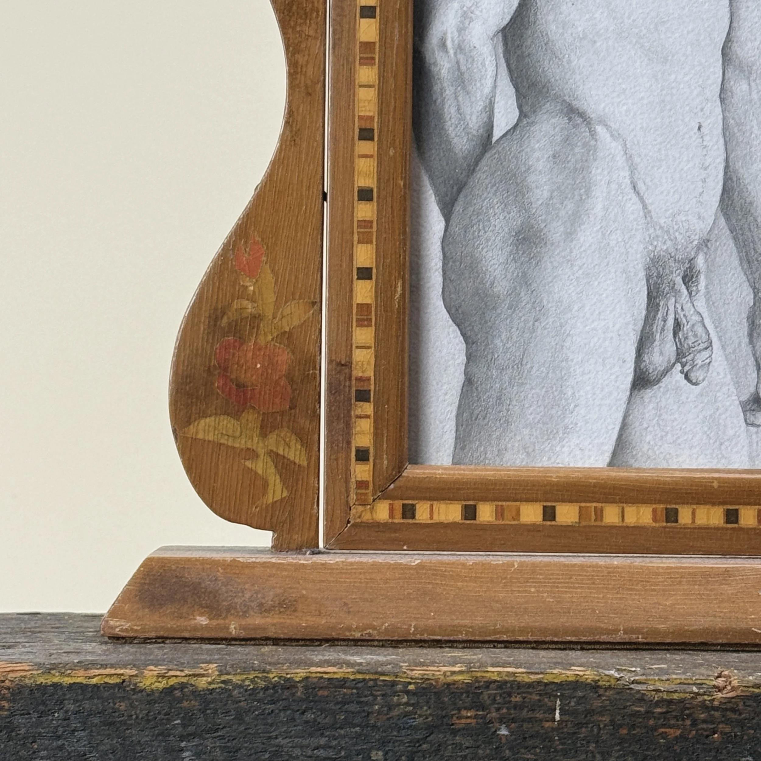 Frame corner detail. Art Nouveau ornament. Inlaid rose motif.