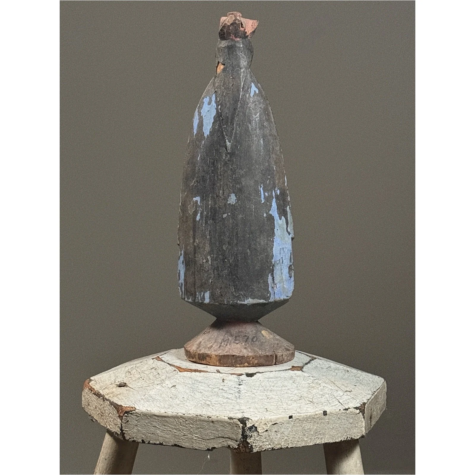 Rear view of the santo, showing the carving of the back and the construction of the base.