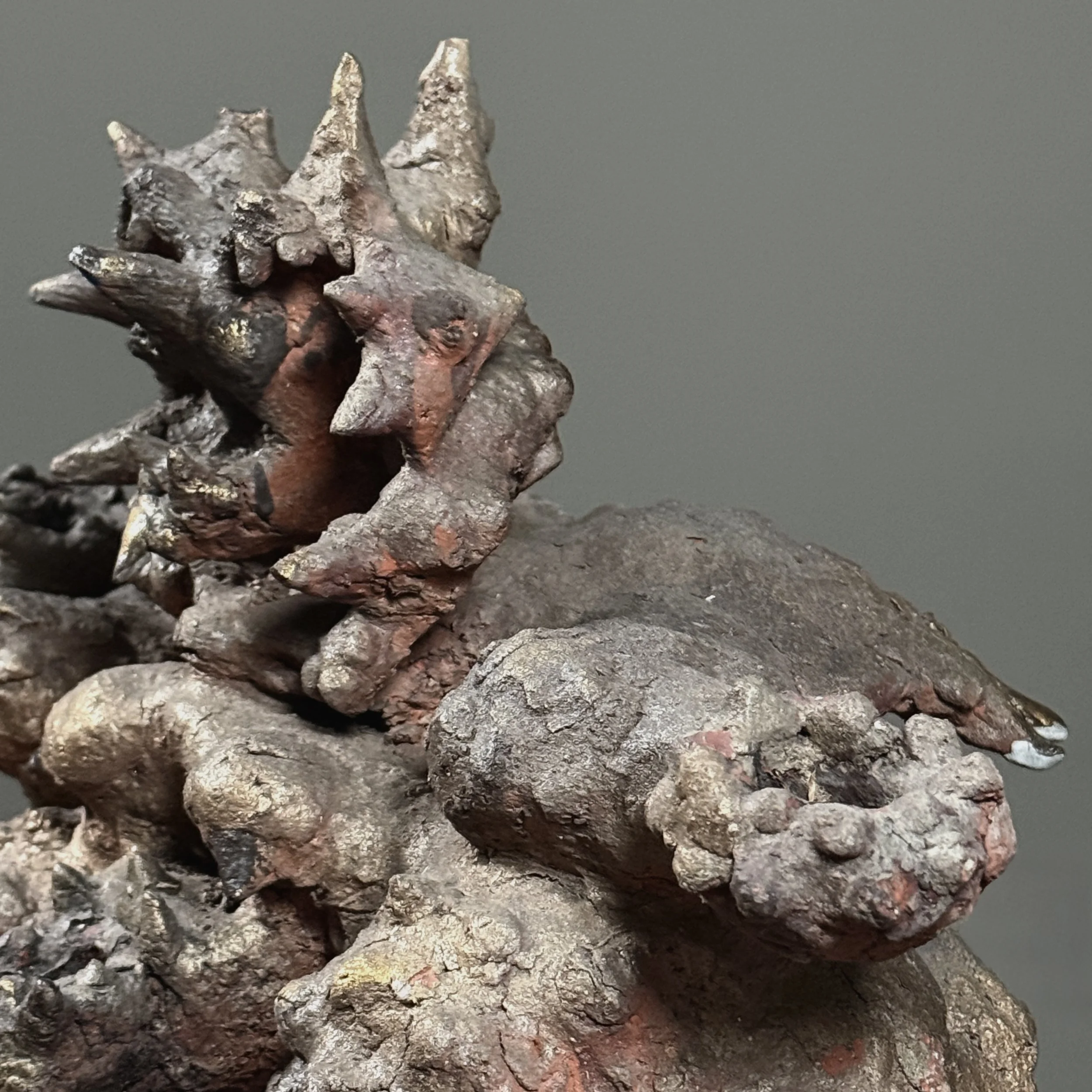 Surface detail. Stoneware texture. Painted finish.