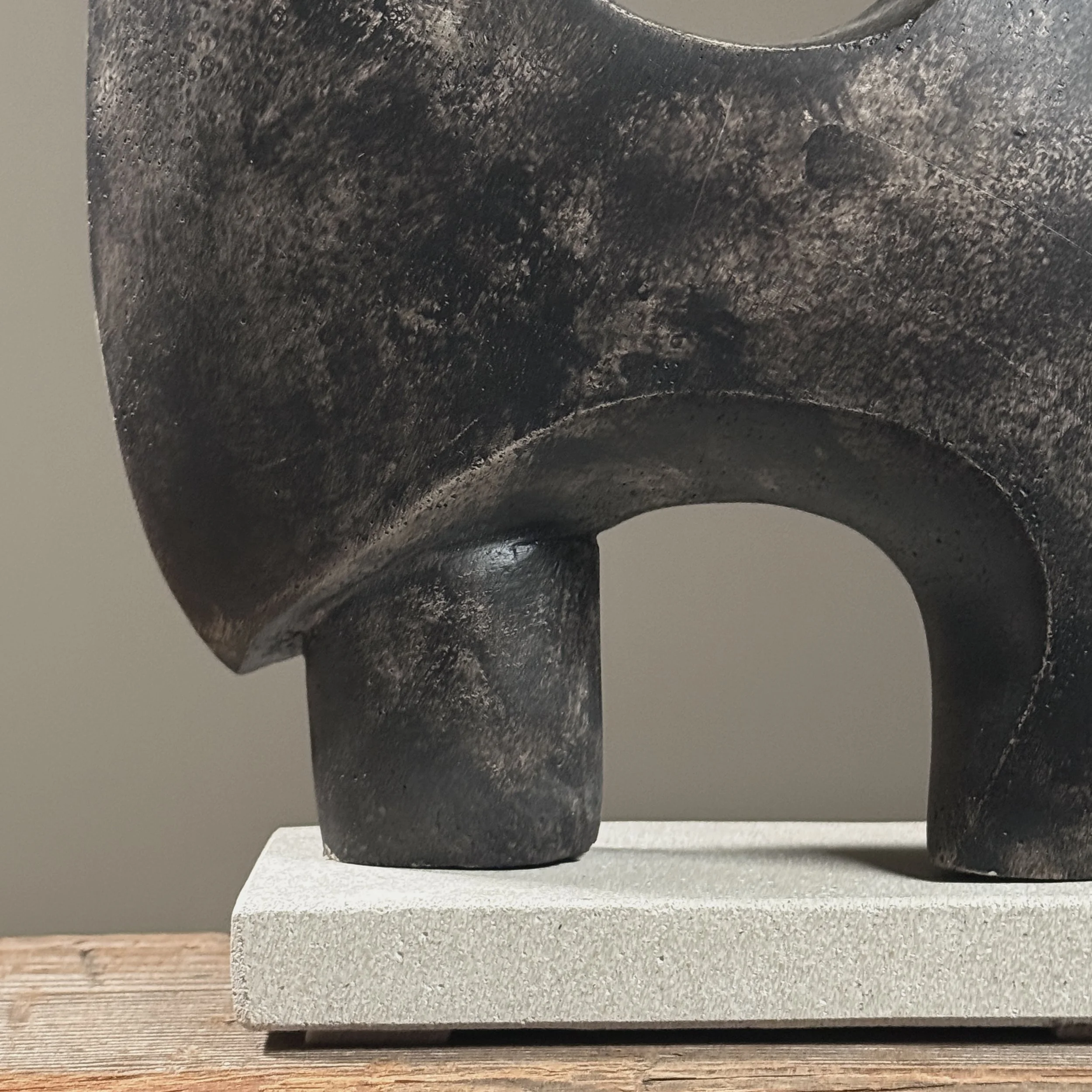 Macro detail of the cement surface texture and subtle tonal variations in the patina