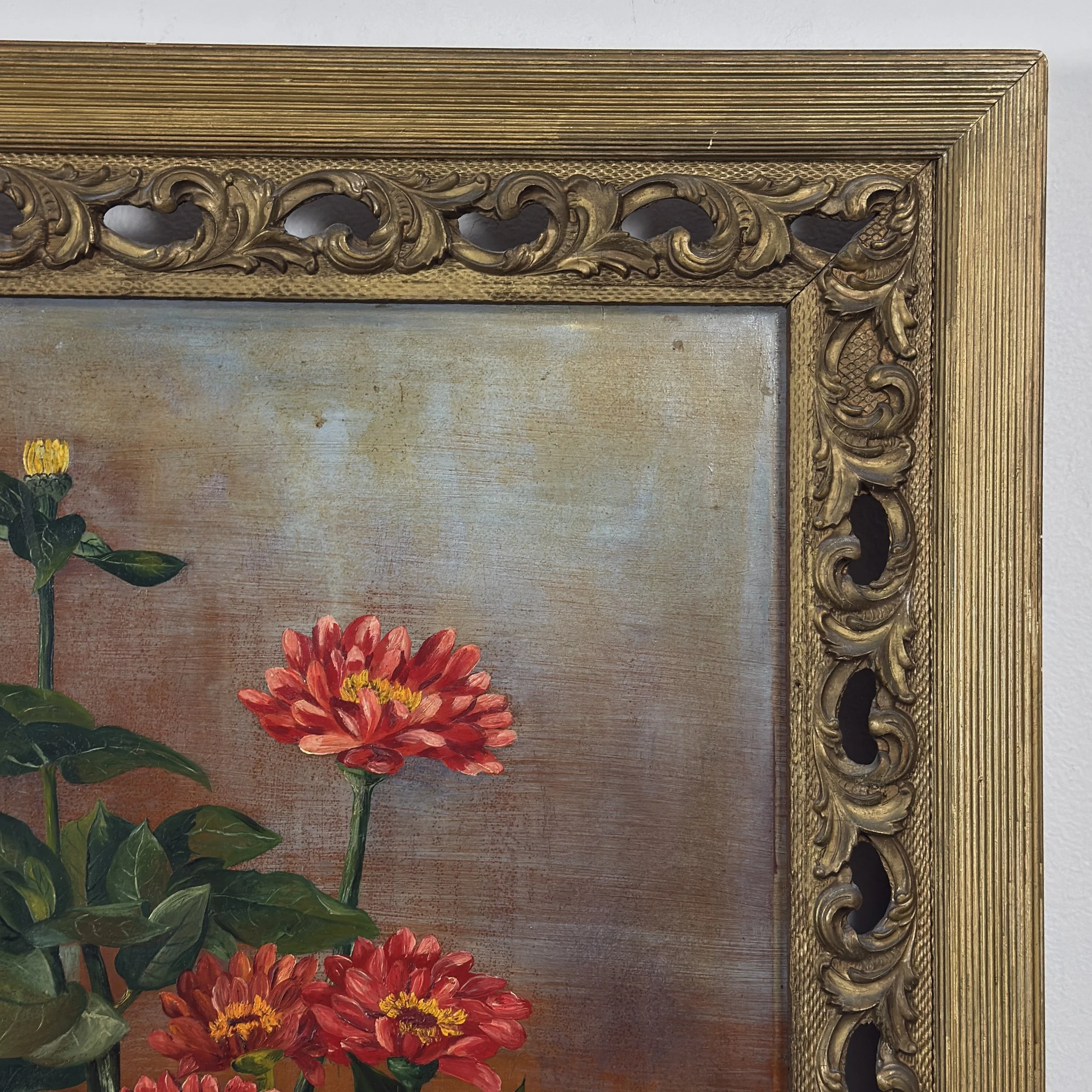 Scroll cut-out frame detail, coral zinnia still life