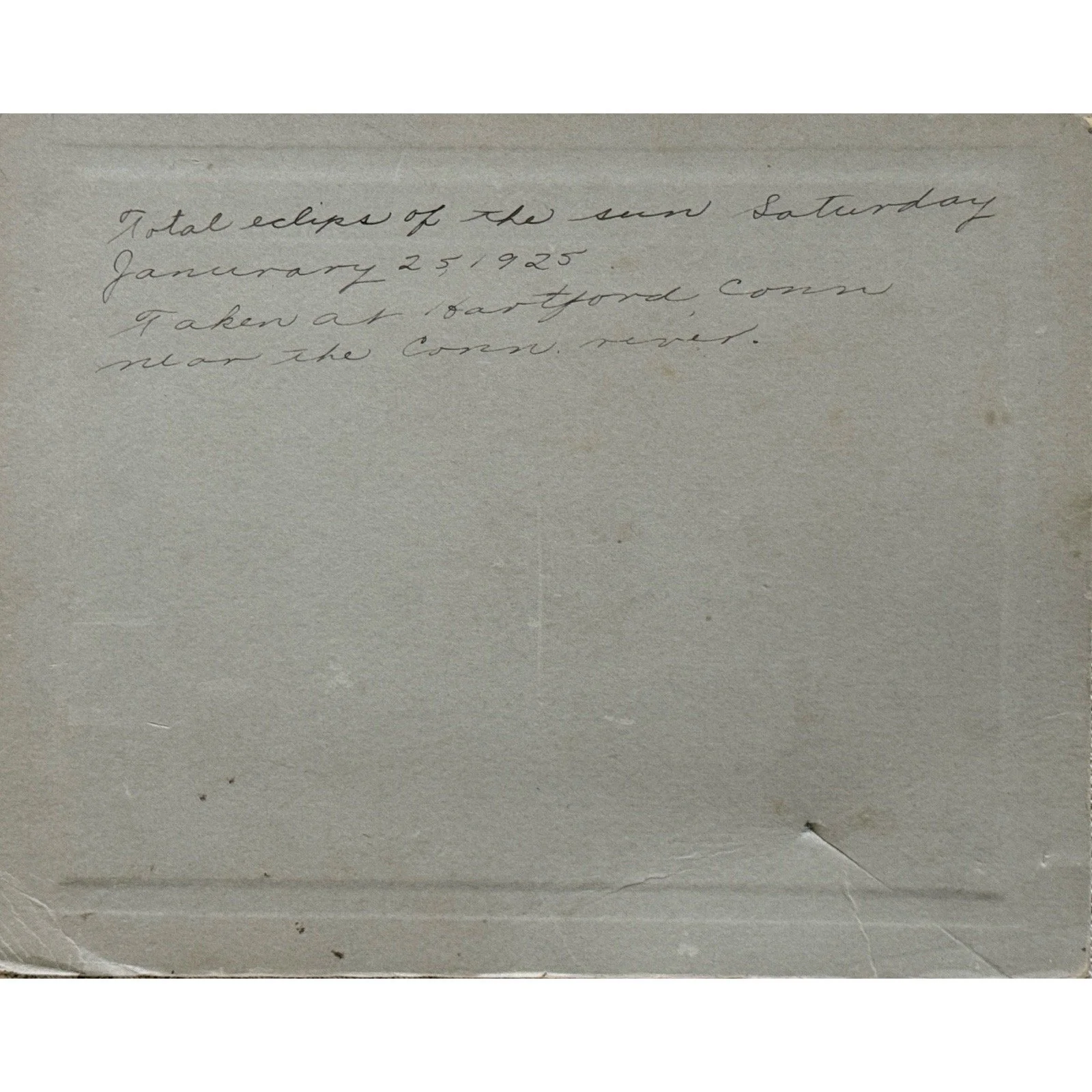 Close-up of inscription. Handwritten text documenting date and location.