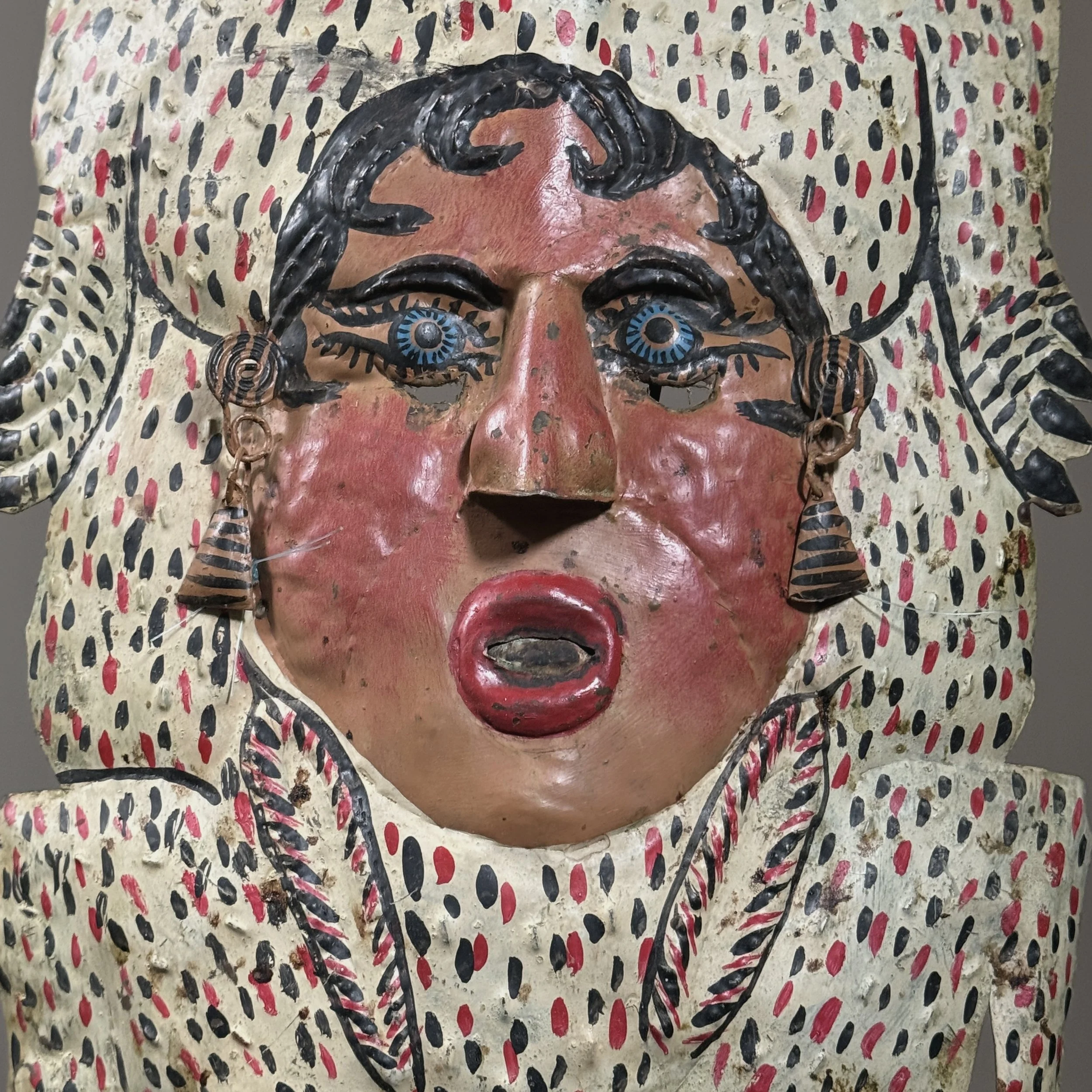 Rabbit-shaped mask with central female portrait in copper