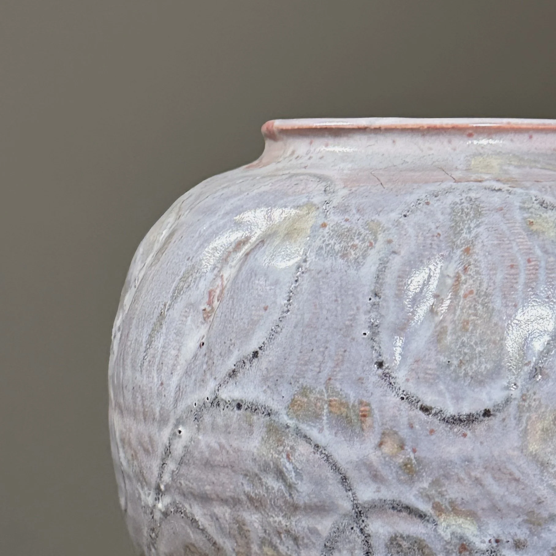 Close-up of the purple glaze texture and finish.