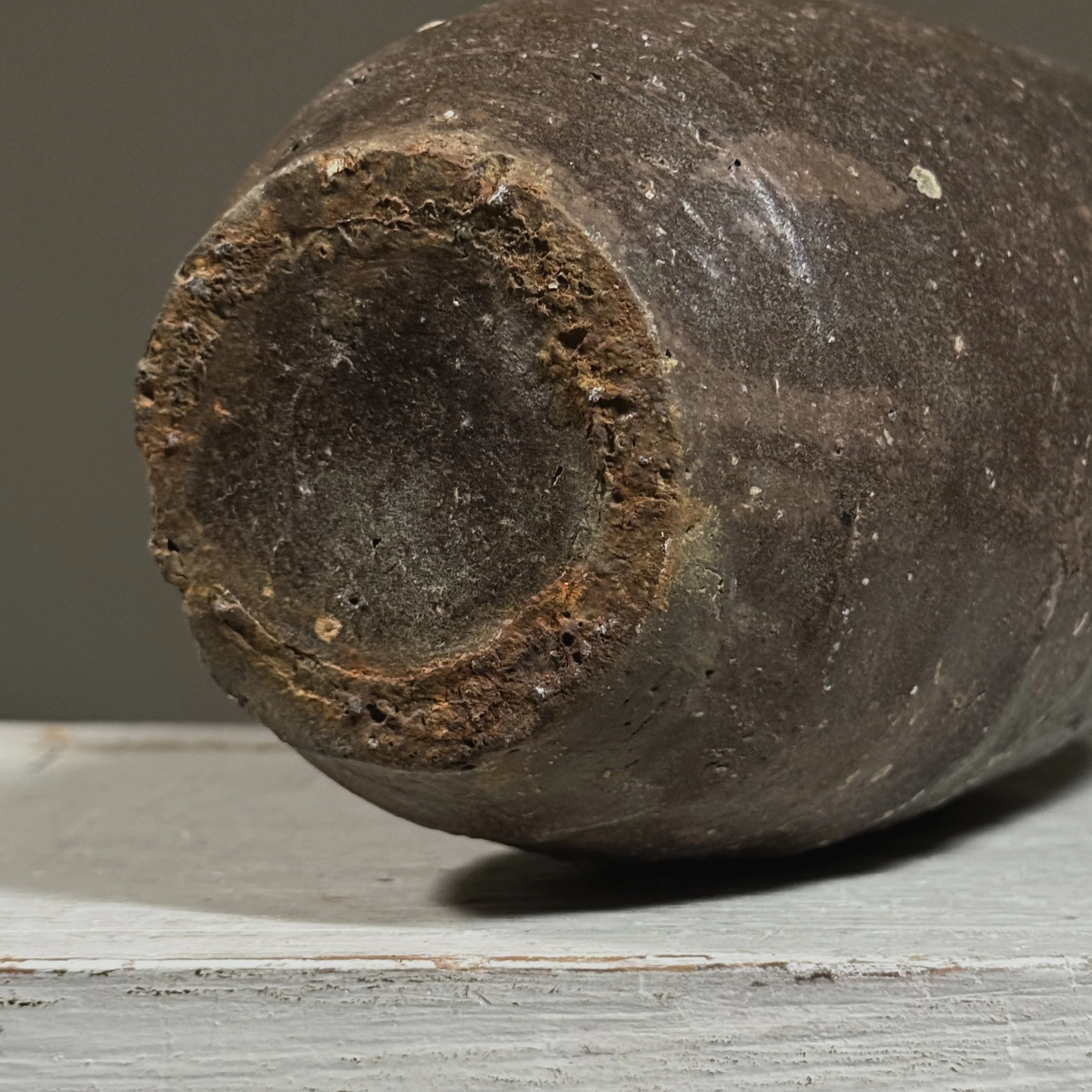 Detail of the brown glaze surface and subtle variations in color and texture.