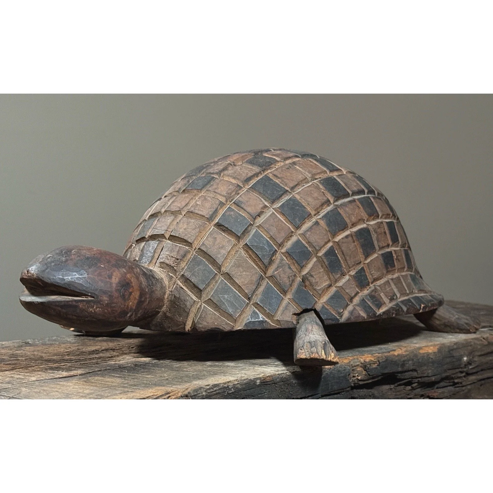 Carved wooden turtle with polychrome shell