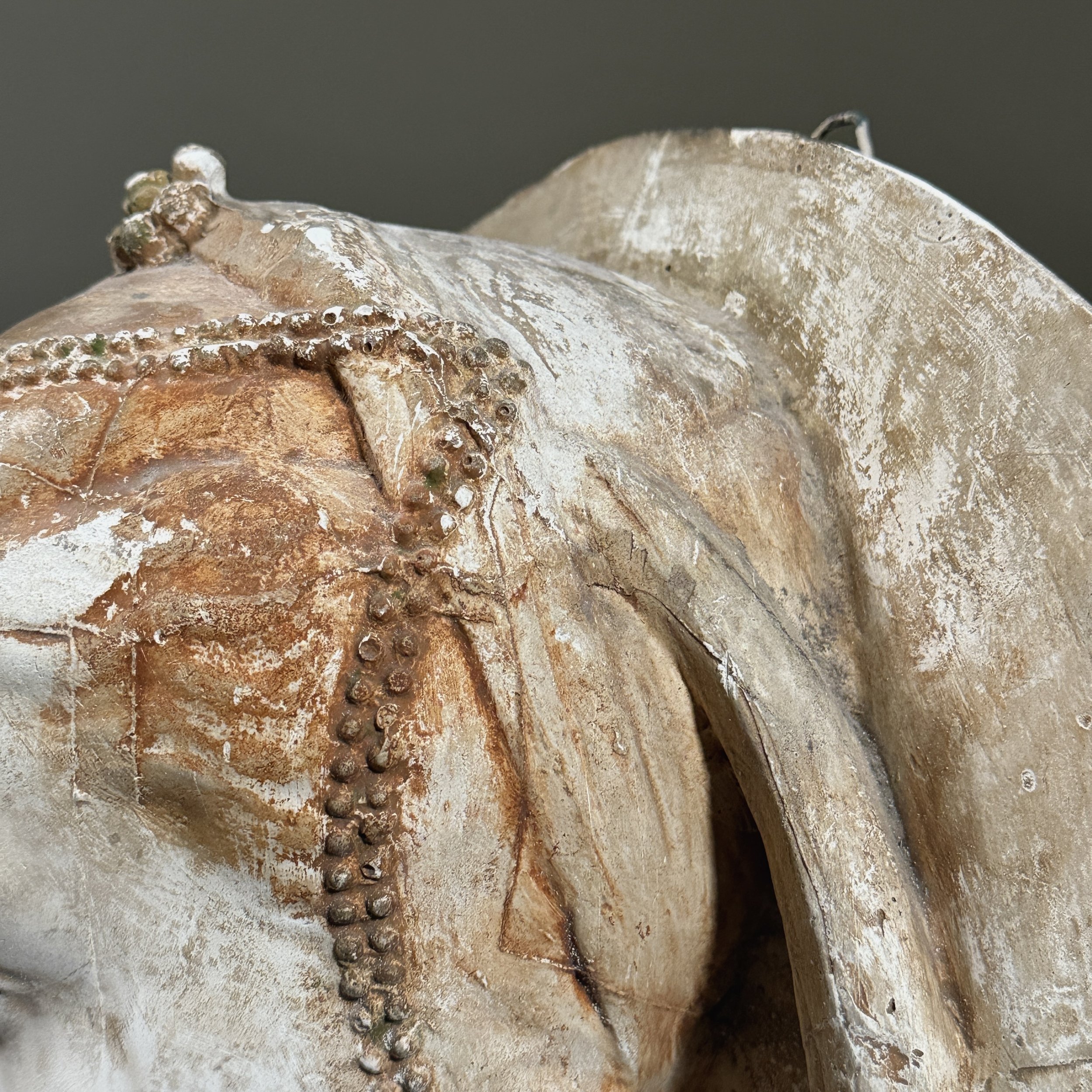 Close-up of surface texture and age-related craquelure.