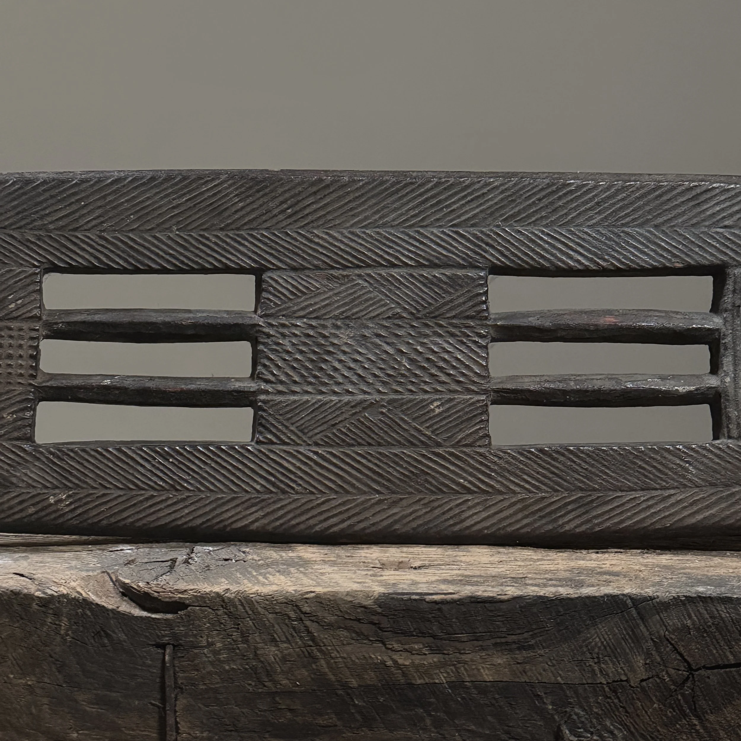 Carved tribal African backrest with patina