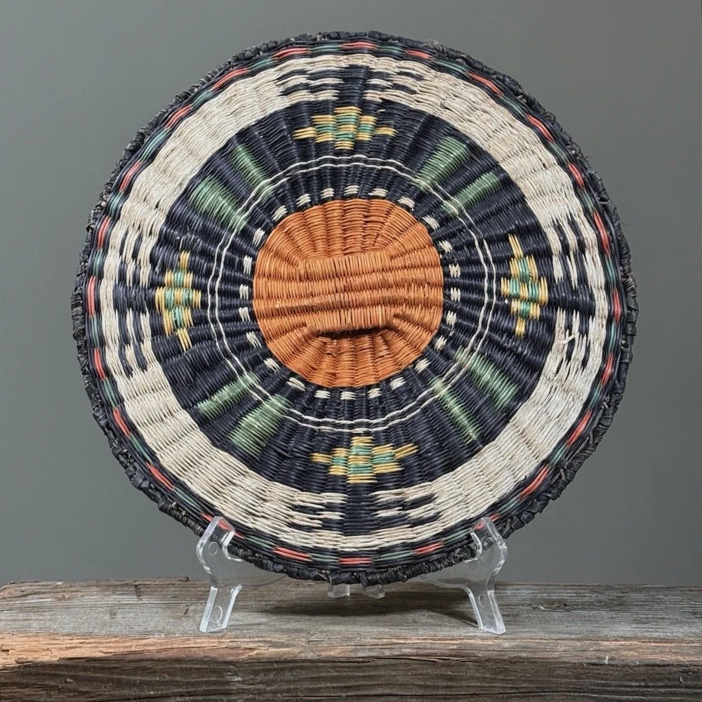 Front view of a vintage Hopi Third Mesa wicker plaque, circa 1950.