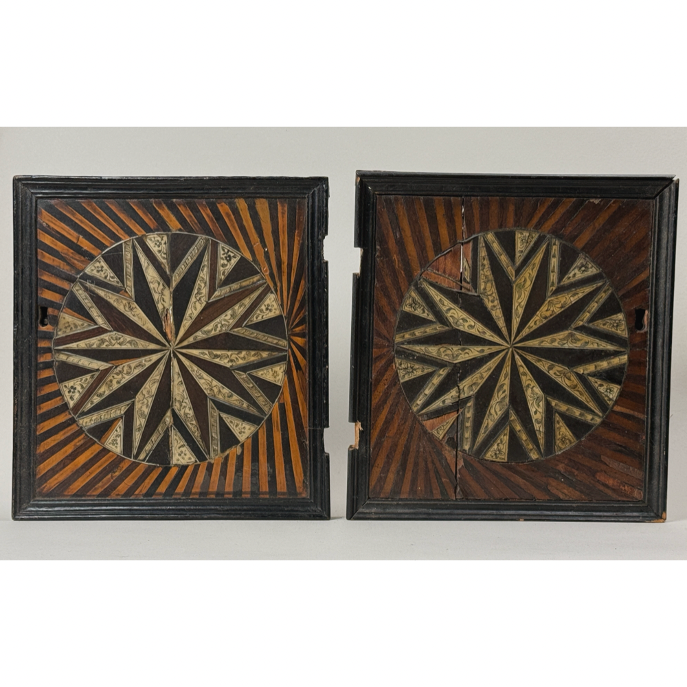 Pair of 19th century French parquetry cabinet doors. Sunburst inlay design. Each 10.25 by 9.4 inches.