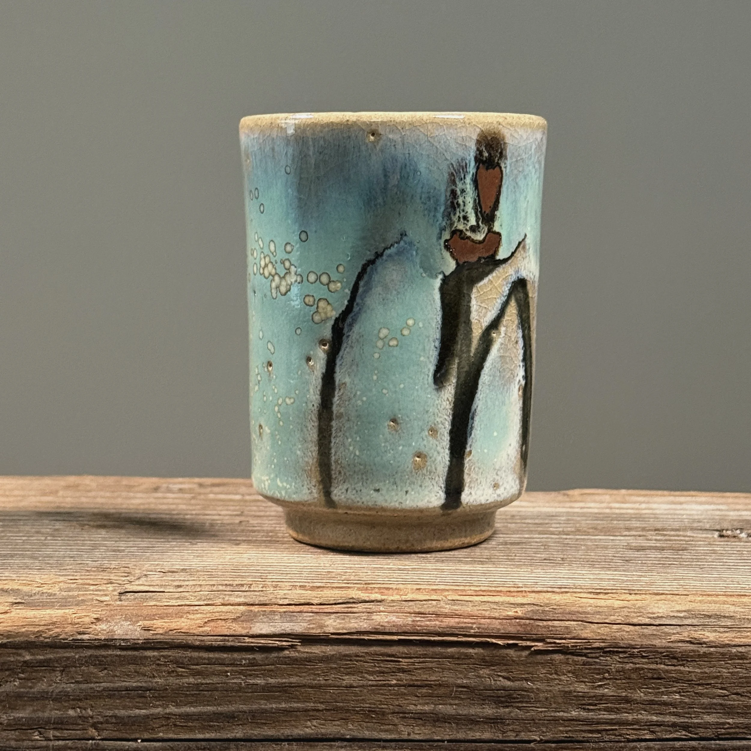Front view of blue cup.