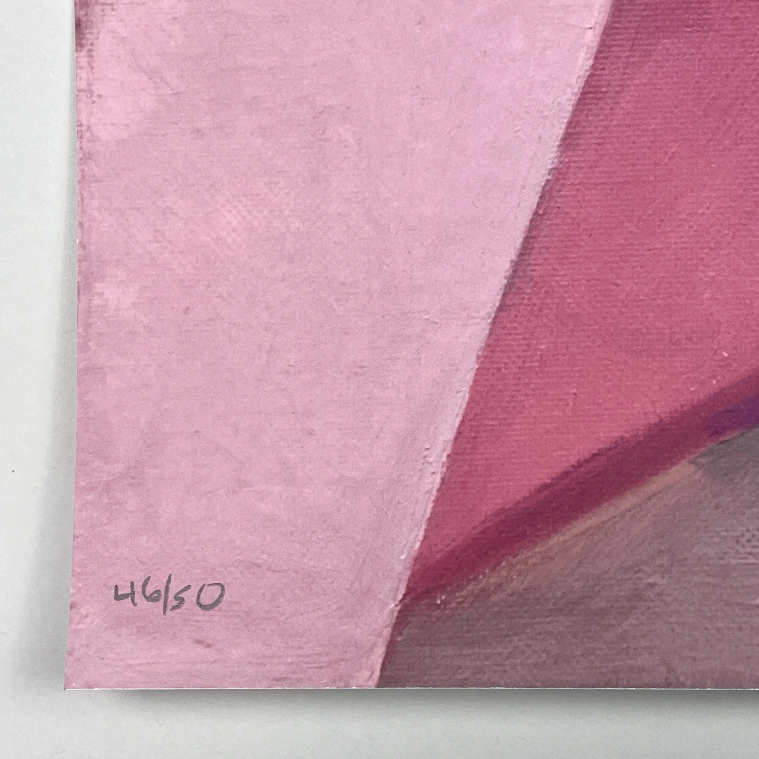 Detail of the edition number and pencil markings in the margin.