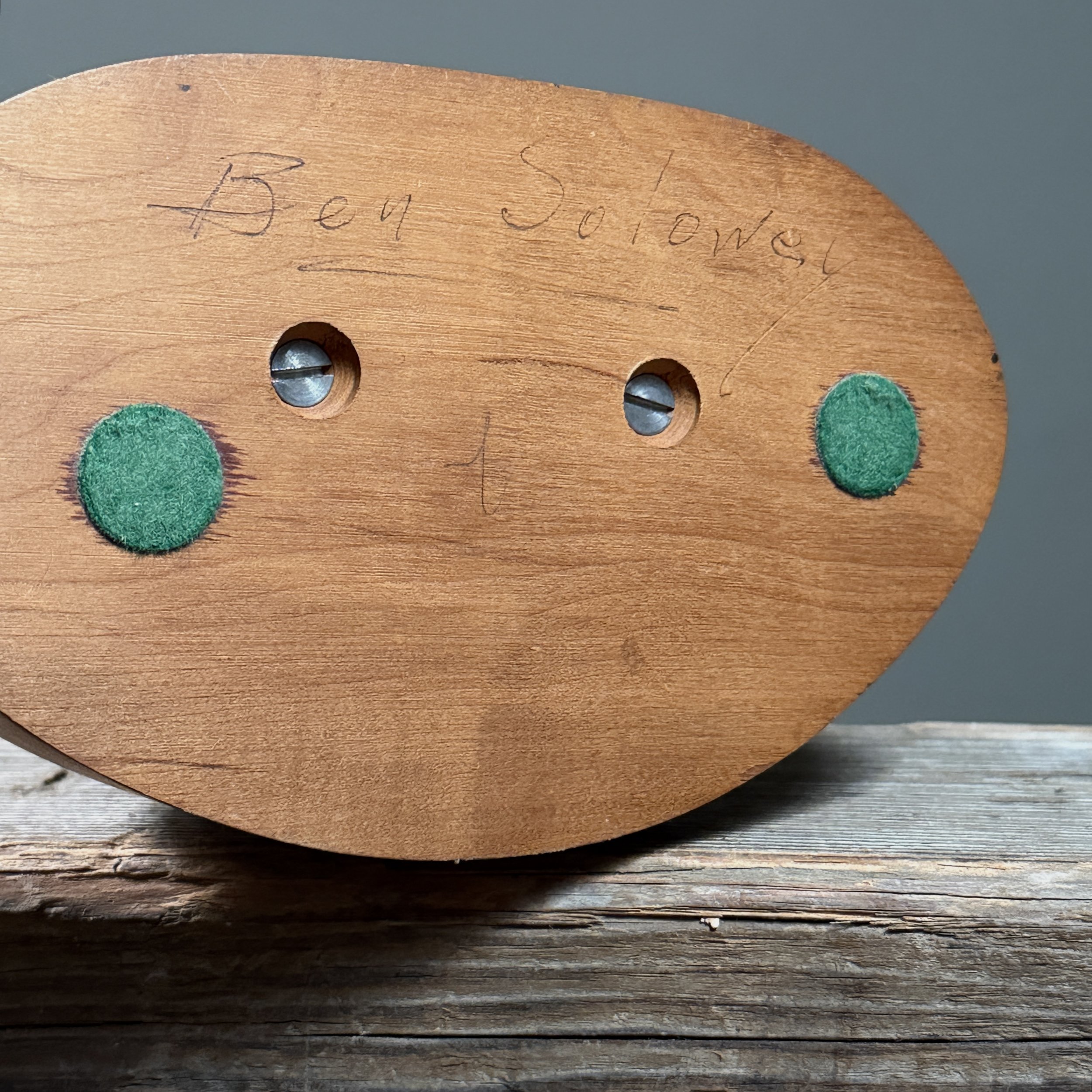Signature on the bottom of the base.