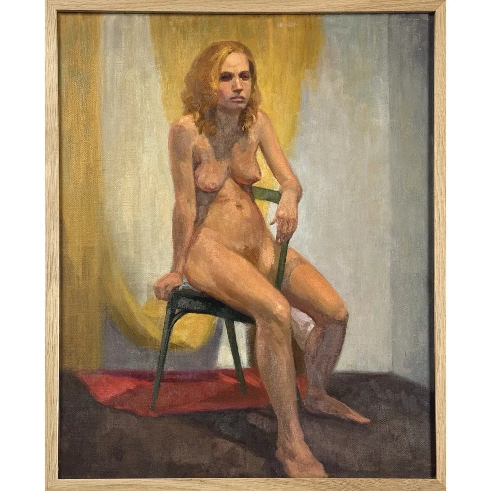 Realist studio study of a nude model seated on a green chair against a draped fabric background.