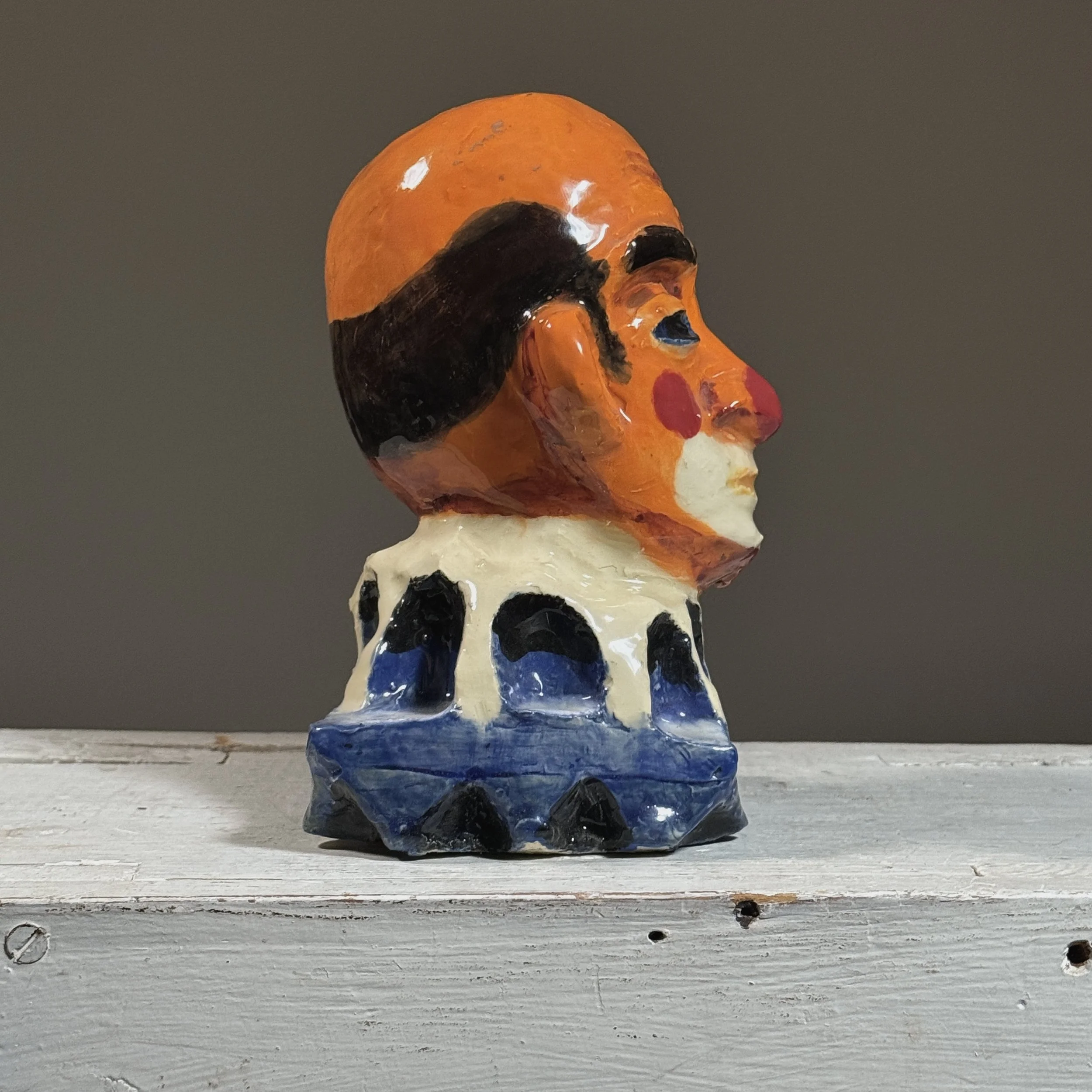 Side profile of an expressionist plaster bust by Philadelphia artist Jack Gerber