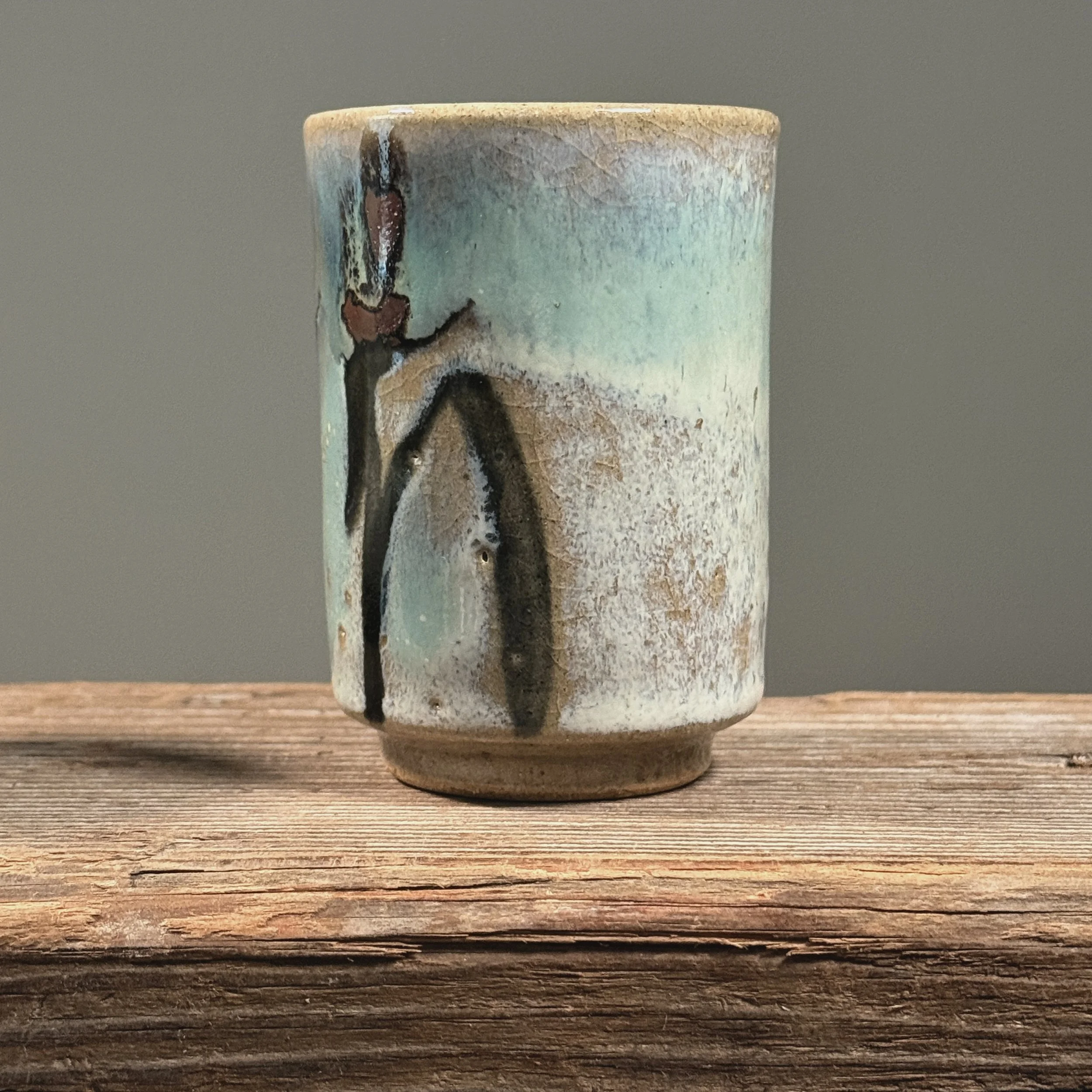 Side view of blue cup.