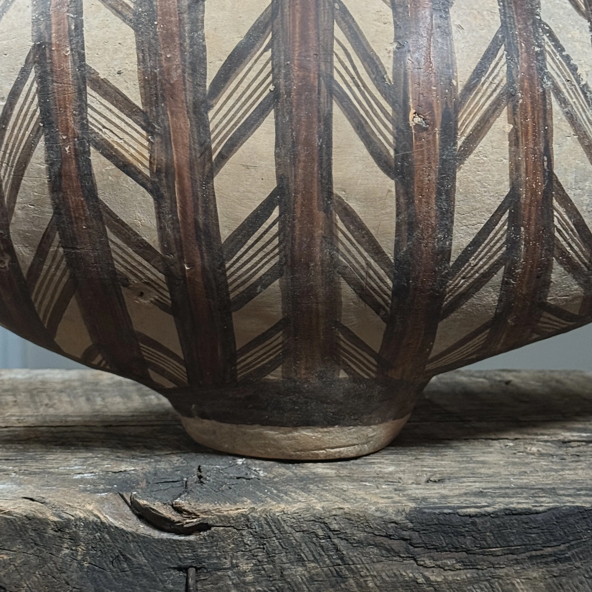 Close-up of geometric black and red motifs