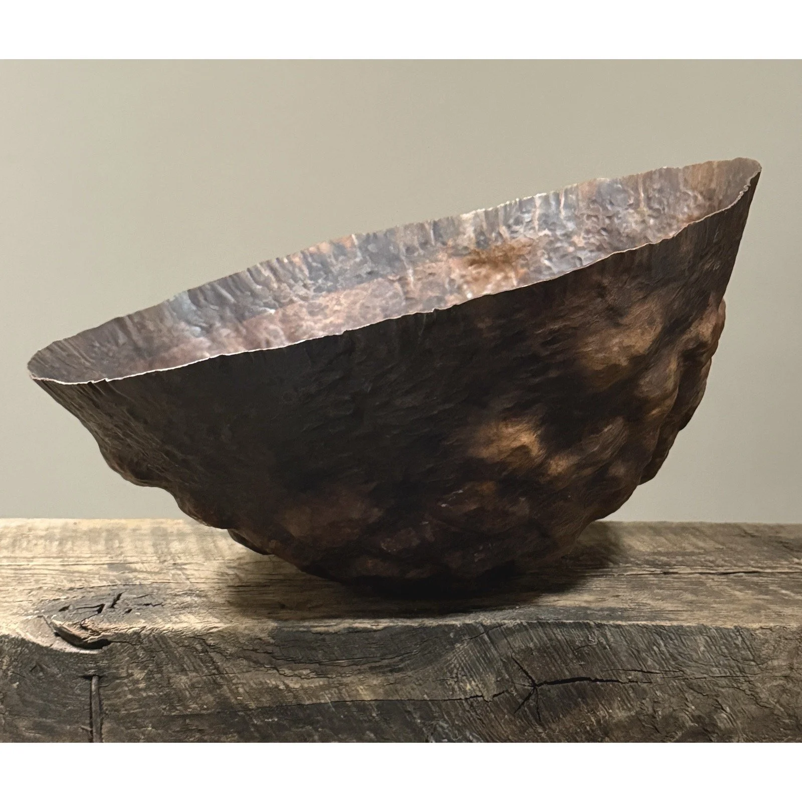 Side view showing the sculptural hammered texture and patina of Di Bona copper bowl.