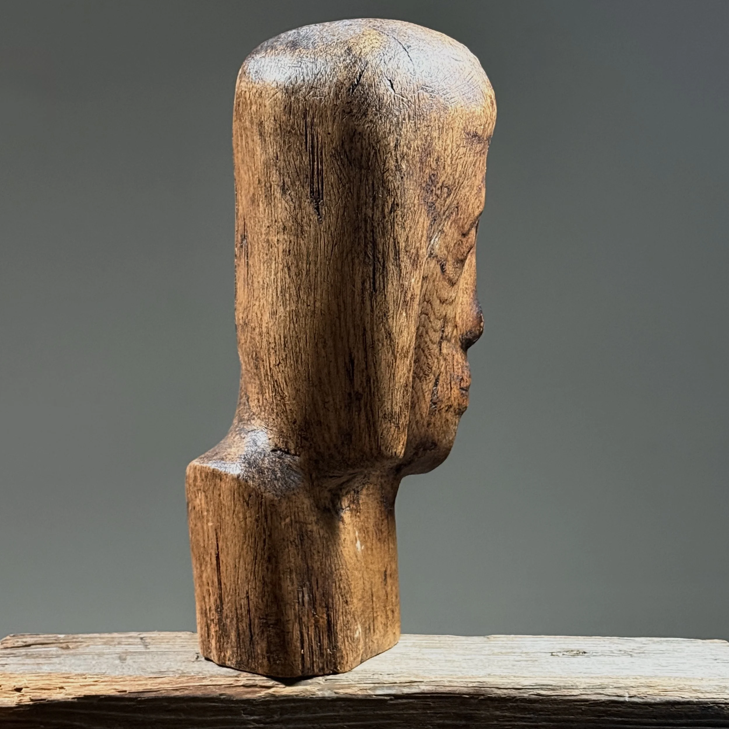 Profile view of vintage hand carved Folk Art Modernist portrait bust, wood sculpture, deep surface patina