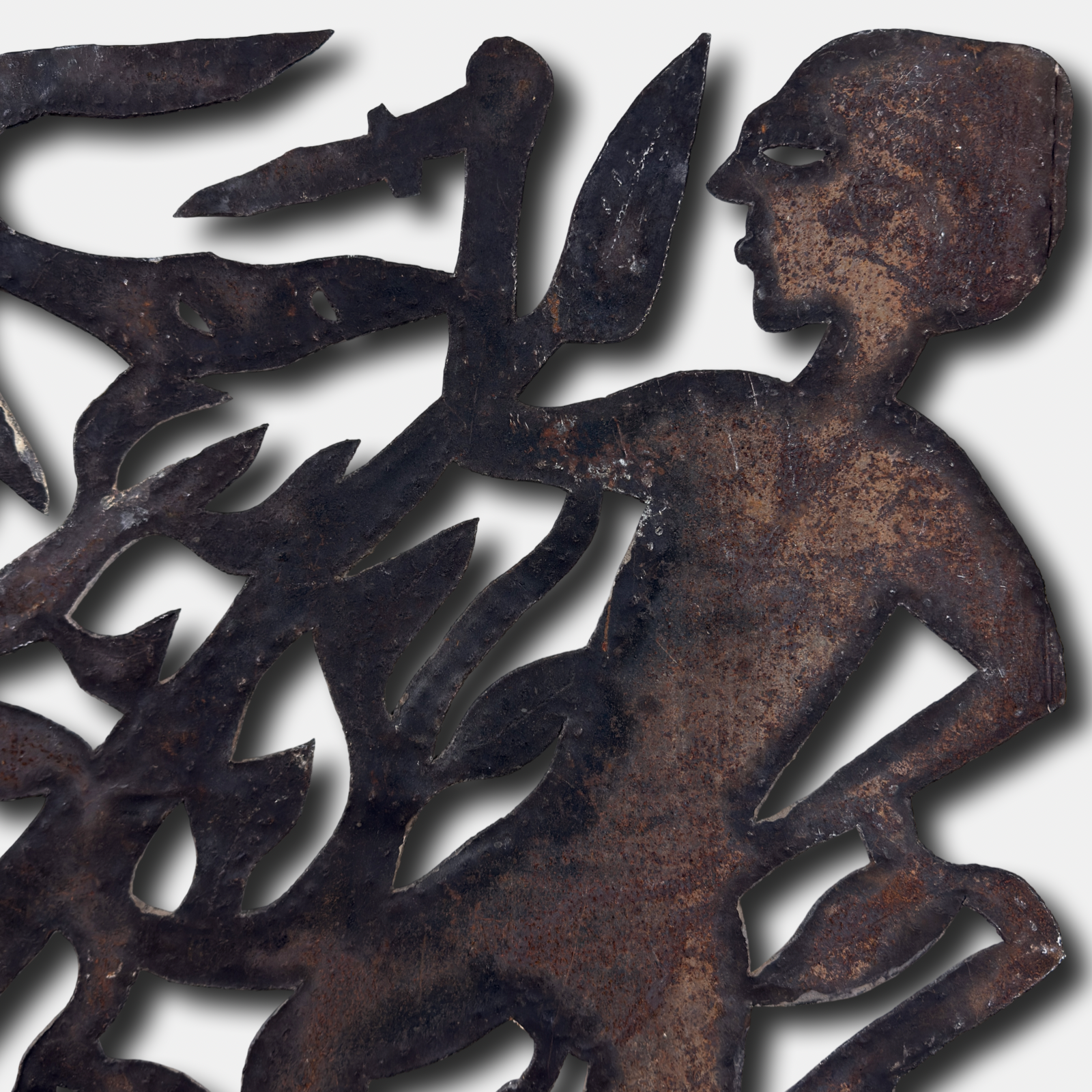 Vintage Haitian folk art cut metal sculpture of two figures and a tree, signed Gelot