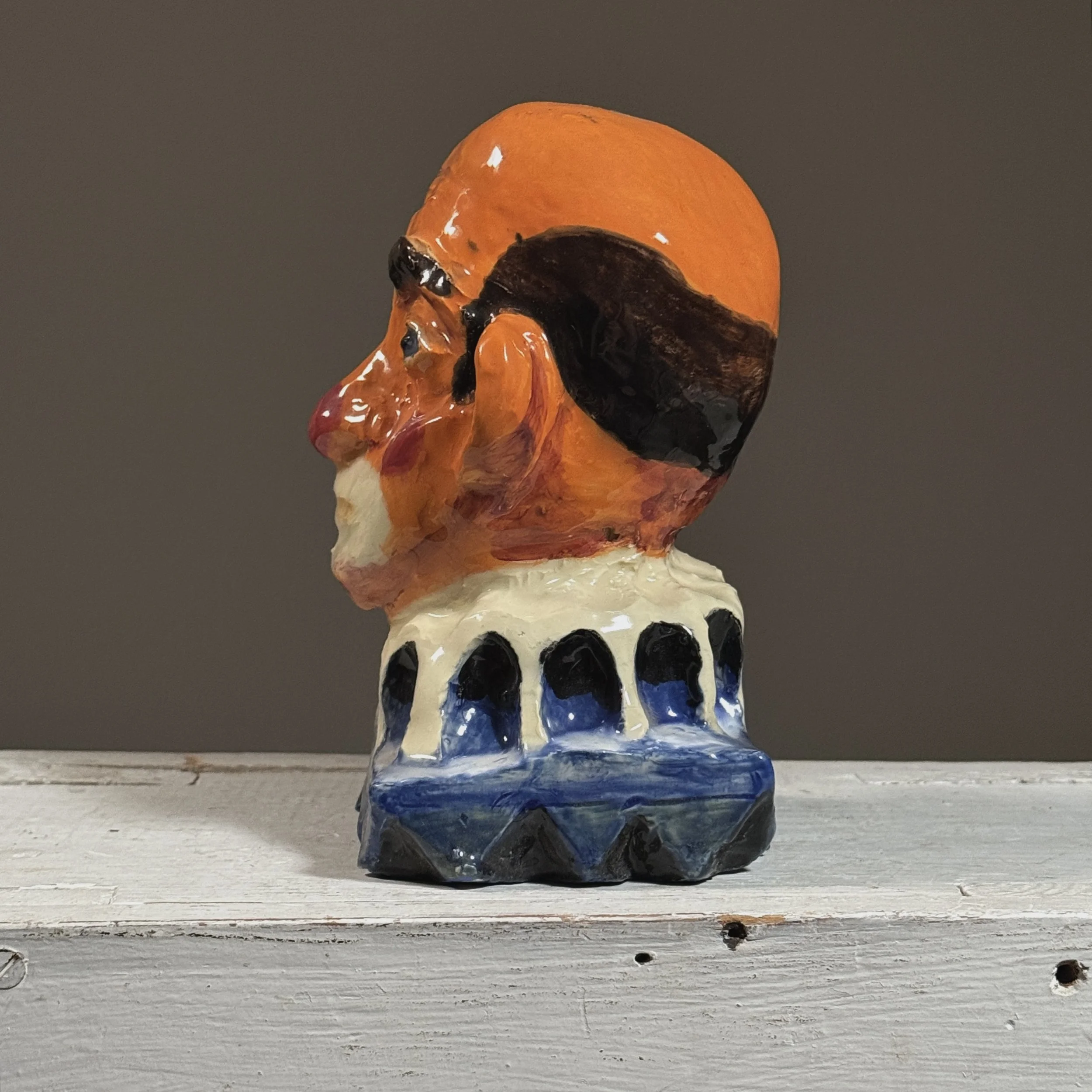 Side profile of an expressionist plaster bust by Philadelphia artist Jack Gerber