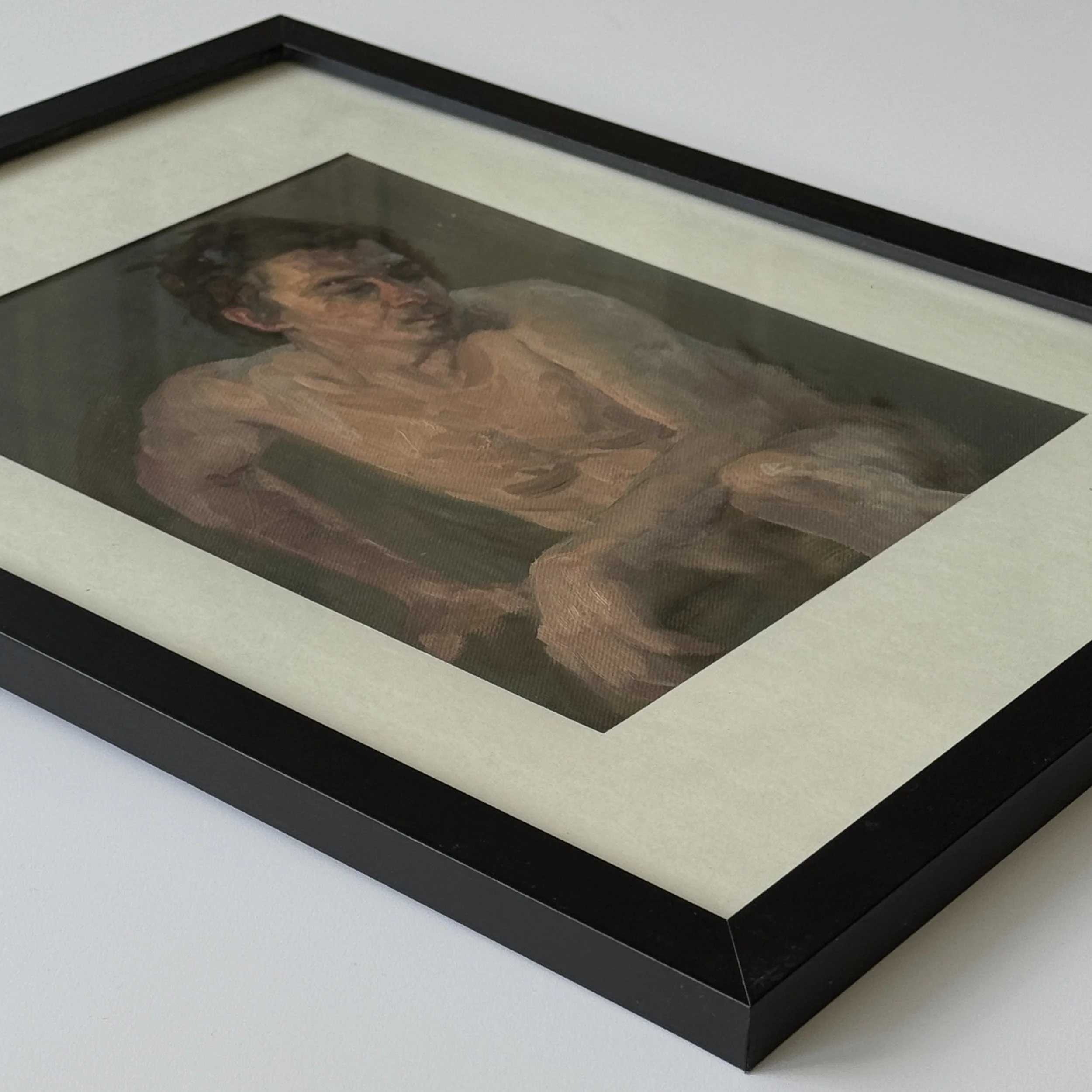 Matted and framed male nude oil painting with glass cover